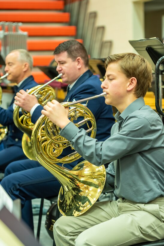 TSgt Manuel A. Collazo-Llantin teaches students as part of the United States Air Force Band's Advancing Innovation through Music program.