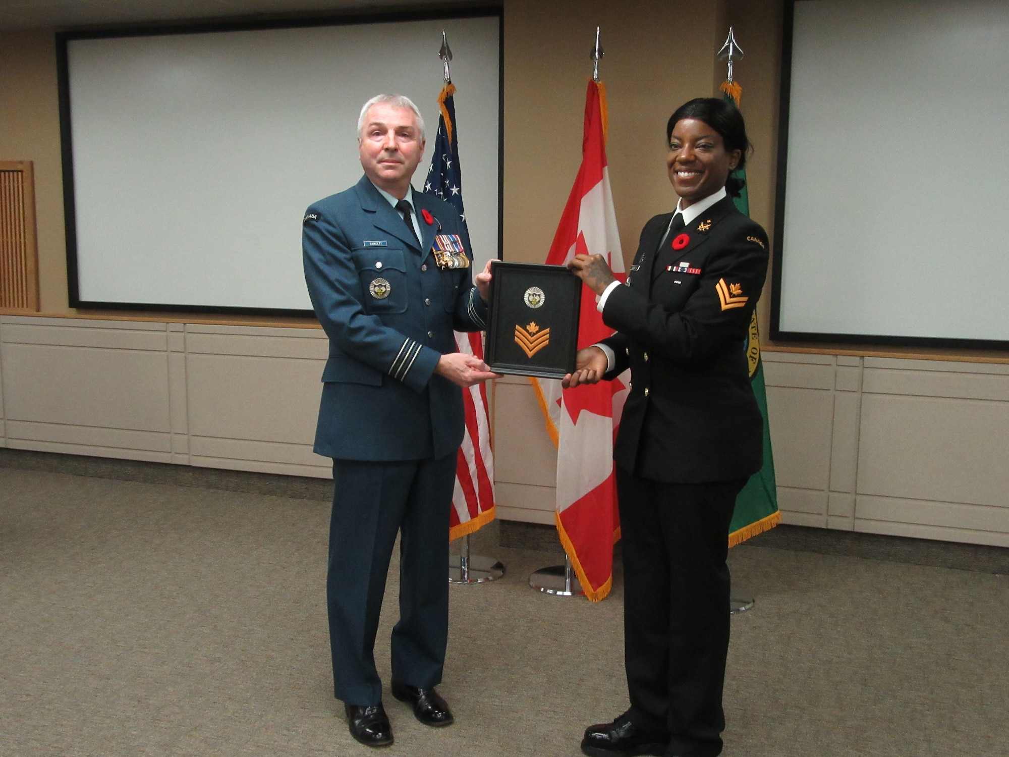 Ogunniya receives her Petty Officer 2nd Class rank