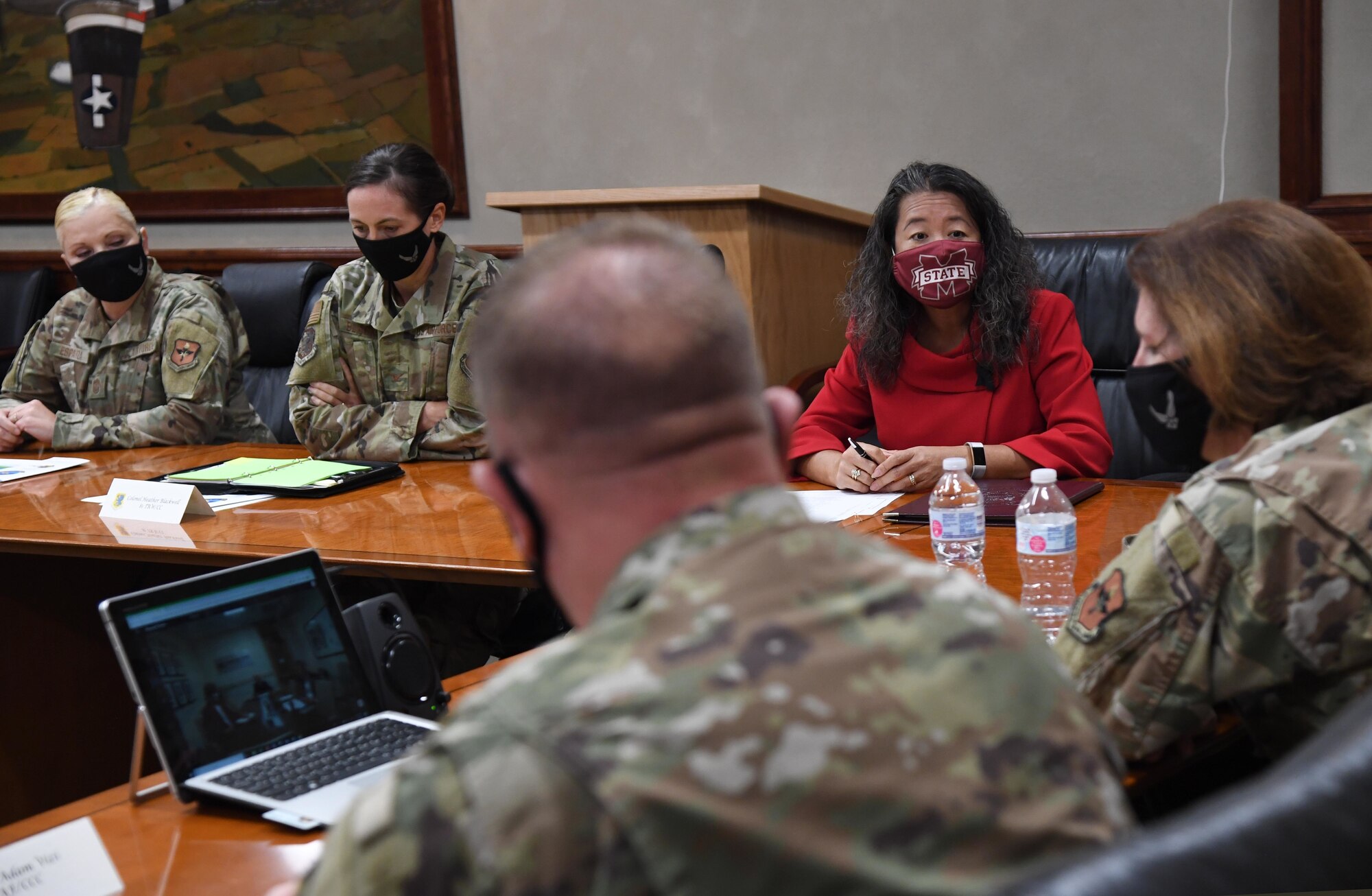 U.S. Air Force Violet Brantley, 81st Training Group training administrator, briefs Maj. Gen. Andrea Tullos, Second Air Force commander, and Chief Master Sgt. Adam Vizi, Second Air Force command chief, on Keesler's Cyber Center's mission and capabilities during an immersion tour inside Stennis Hall at Keesler Air Force Base, Mississippi, Nov. 23, 2020. Tullos and Vizi also toured the 81st Mission Support Group and the 81st Medical Group. (U.S. Air Force photo by Kemberly Groue)
