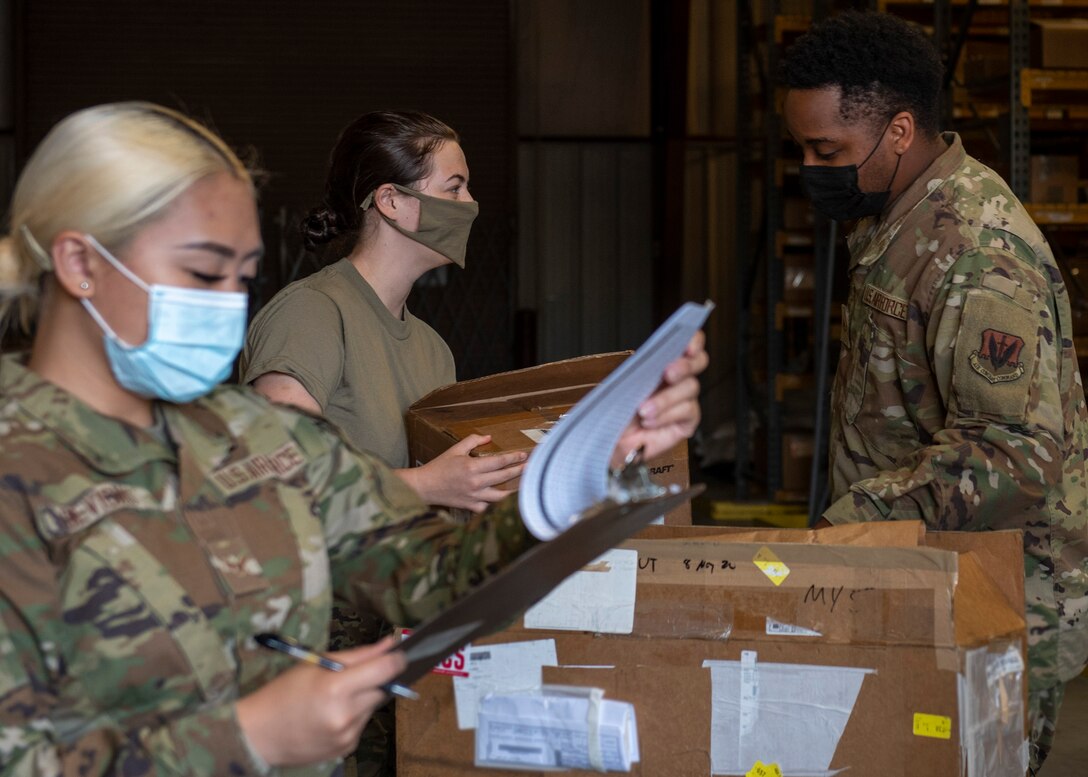Material management Airmen from the 4th Logistics Readiness Squadron flight service center, check maintenance items into an inventory tracking system at Seymour Johnson Air Force Base, North Carolina, Nov. 6, 2020.