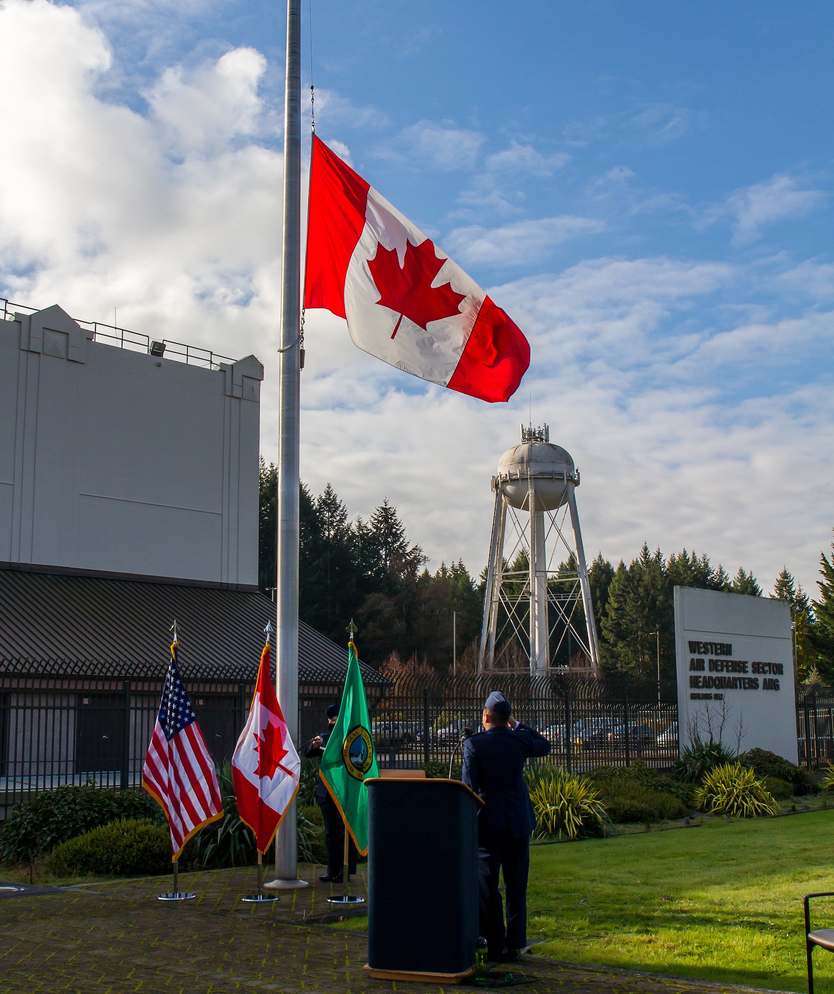 Capt. Thomas Nguyen salutes the Canadian flag