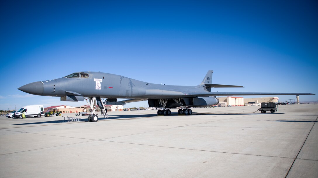 A B-1B Lancer with a Joint Air-to-Surface Standoff Missile (JASSM) undergoes pre-flight procedures prior to a captive carry external weapons demonstration flight at Edwards Air Force Base, California, Nov. 17. (Air Force photo by Giancarlo Casem)