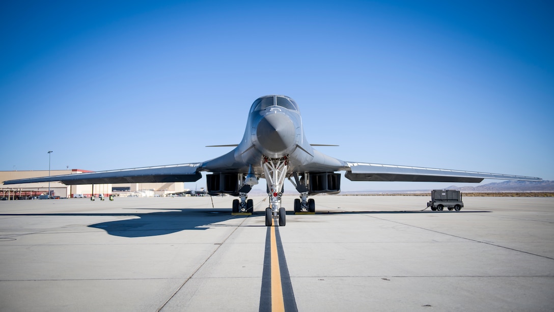 A B-1B Lancer with a Joint Air-to-Surface Standoff Missile (JASSM) undergoes pre-flight procedures prior to a captive carry external weapons demonstration flight at Edwards Air Force Base, California, Nov. 17. (Air Force photo by Giancarlo Casem)
