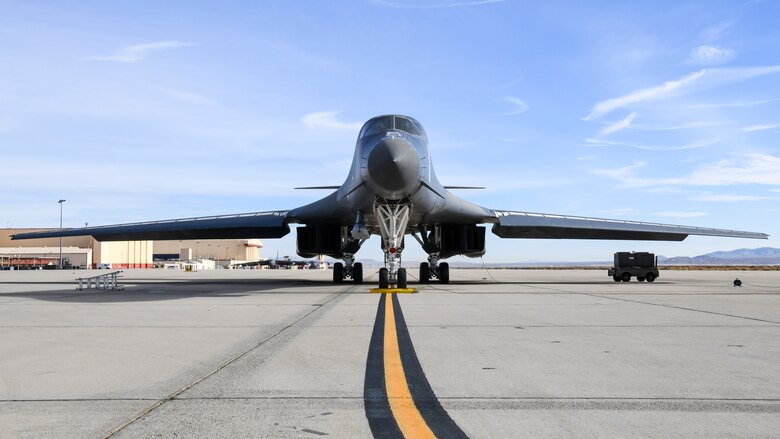 A B-1B Lancer prepares to conduct a captive carry flight to demonstrate its external weapons carriage capabilities at Edwards Air Force Base, California, Nov. 20. (Air Force photo by 2nd Lt. Christine Saunders)