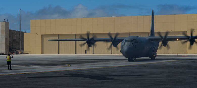 A C-130J Hercules assigned to the 36th Airlift Squadron, Yokota Air Base, Japan, is marshalled onto an apron during a Dynamic Force Employment at Andersen Air Force Base, Guam, Nov. 22, 2020. DFE is an operational platform that allows our forces to be strategically predictable and operationally unpredictable. The U.S. Air Force is postured and ready to respond to crises and contingencies throughout the U.S. Indo-Pacific Command, contributing to regional stability and a free and open Indo-Pacific. (U.S. Air Force photo by Senior Airman Michael S. Murphy)