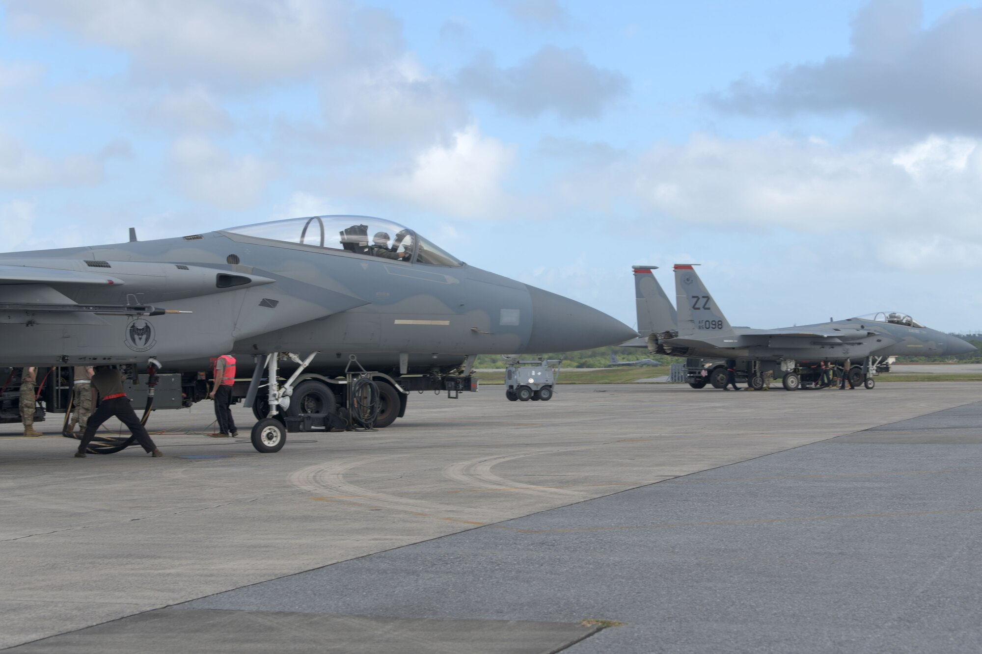The 18th Logistics Readiness Squadron refuels two F-15C Eagles during a “Super Surge,” Nov. 18, 2020, at Kadena Air Base, Japan. The LRS team bested their most gallons in a single day since 2016 with 420,000 by the second day of the surge. (U.S. Air Force photo by Airman 1st Class Rebeckah Medeiros)