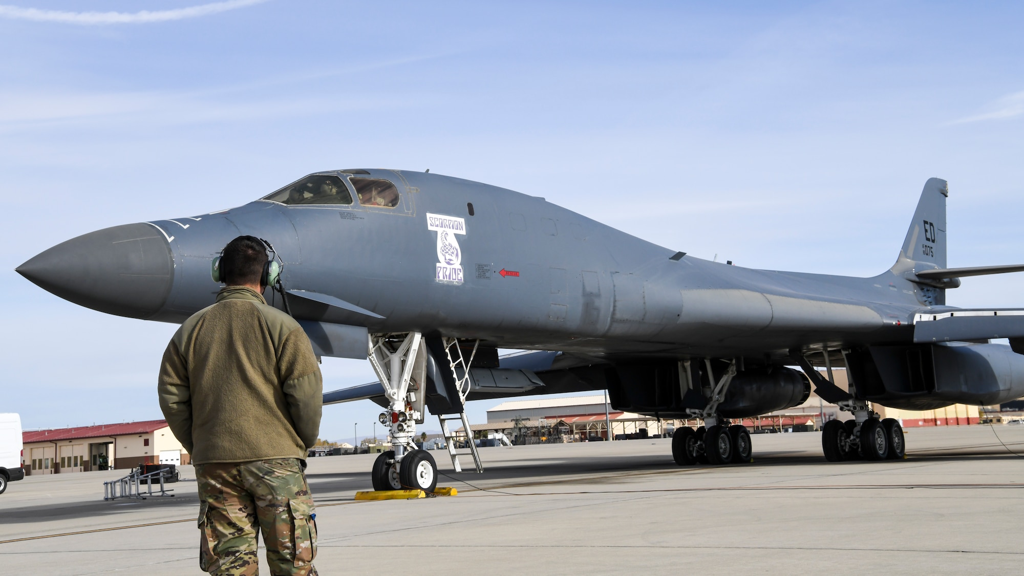 A B-1B Lancer prepares to conduct a captive carry flight to demonstrate its external weapons carriage capabilities at Edwards Air Force Base, California, Nov. 20. (Air Force photo by 2nd Lt. Christine Saunders)