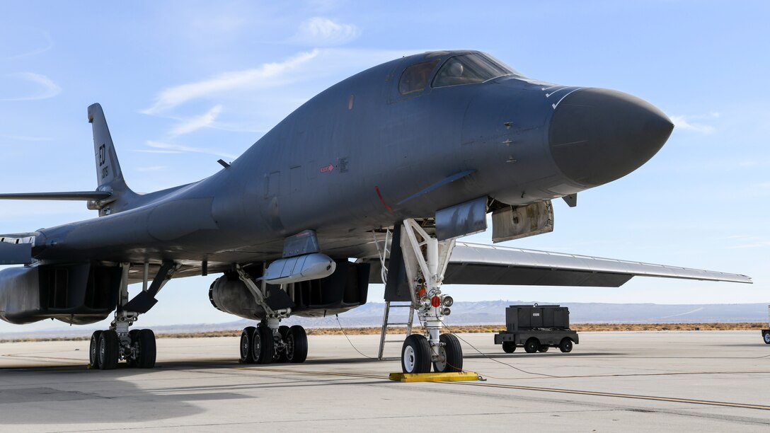 A B-1B Lancer prepares to conduct a captive carry flight to demonstrate its external weapons carriage capabilities at Edwards Air Force Base, California, Nov. 20. (Air Force photo by 2nd Lt. Christine Saunders)