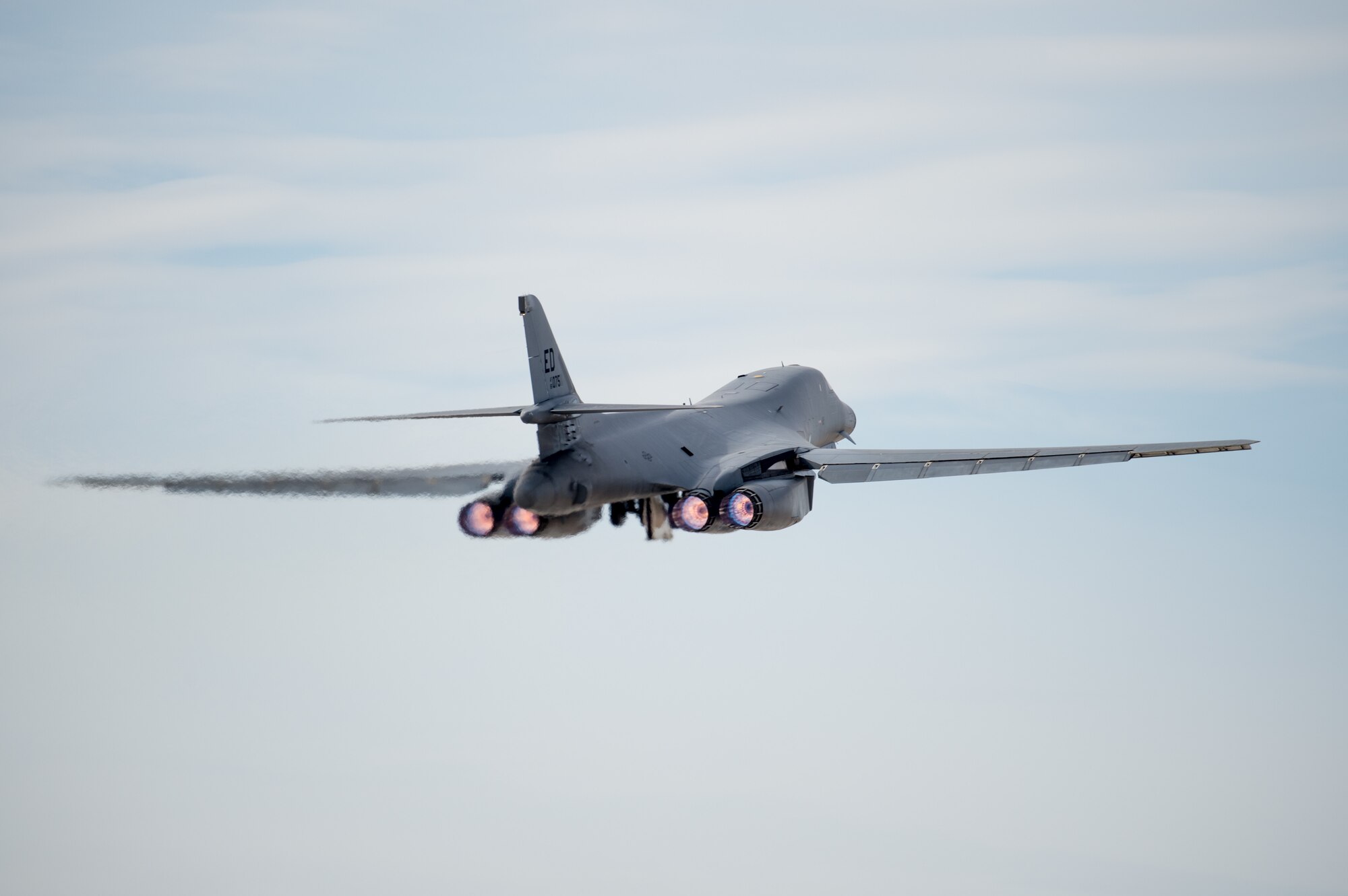 A B-1B Lancer with a Joint Air-to-Surface Standoff Missile (JASSM) takes off from Edwards Air Force Base, California, Nov. 20. The flight was a demonstration of the B-1B’s external weapons carriage capabilities. (Air Force photo by Richard Gonzales)