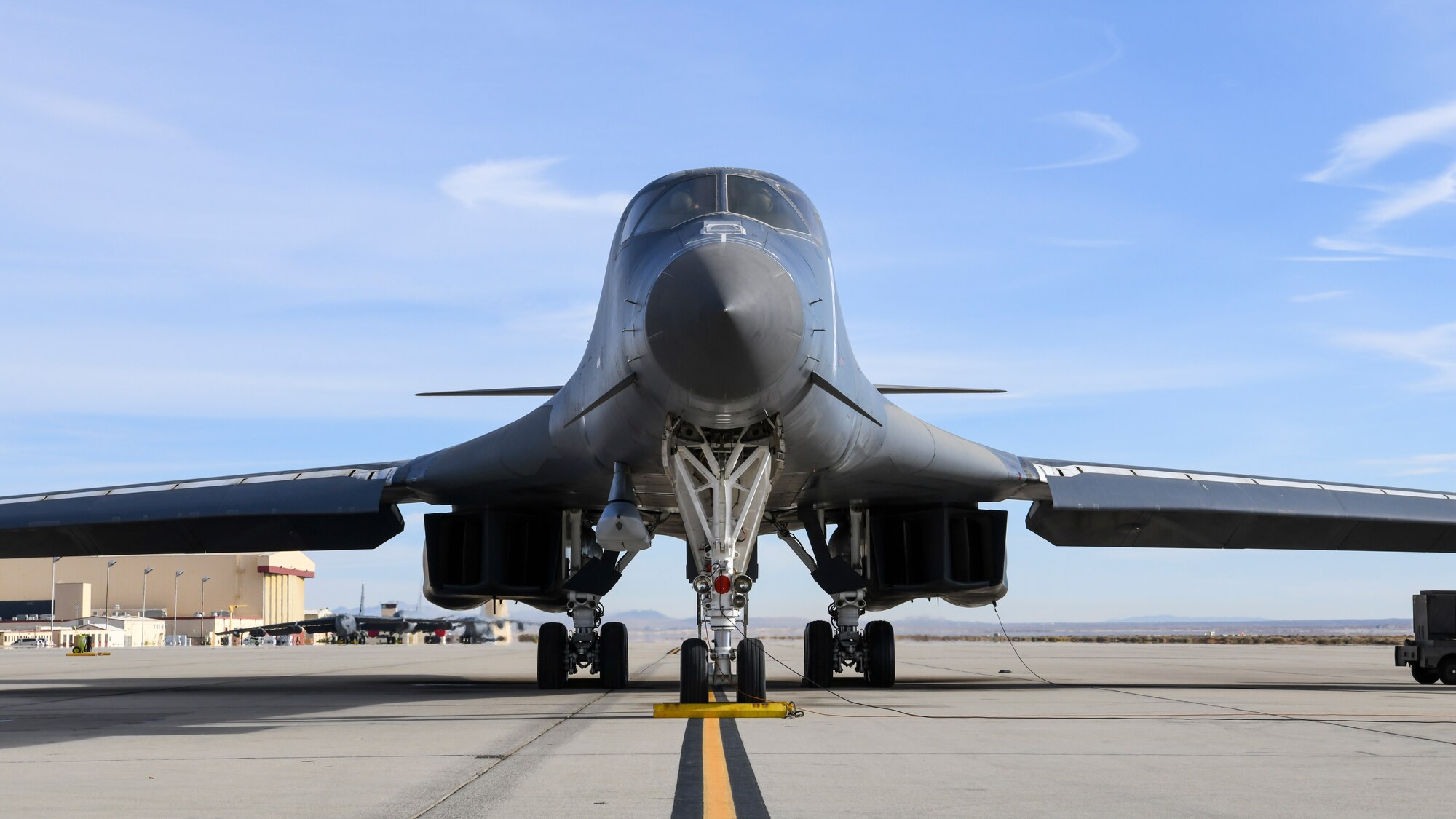 A B-1B Lancer prepares to conduct a captive carry flight to demonstrate its external weapons carriage capabilities at Edwards Air Force Base, California, Nov. 20. (Air Force photo by 2nd Lt. Christine Saunders)