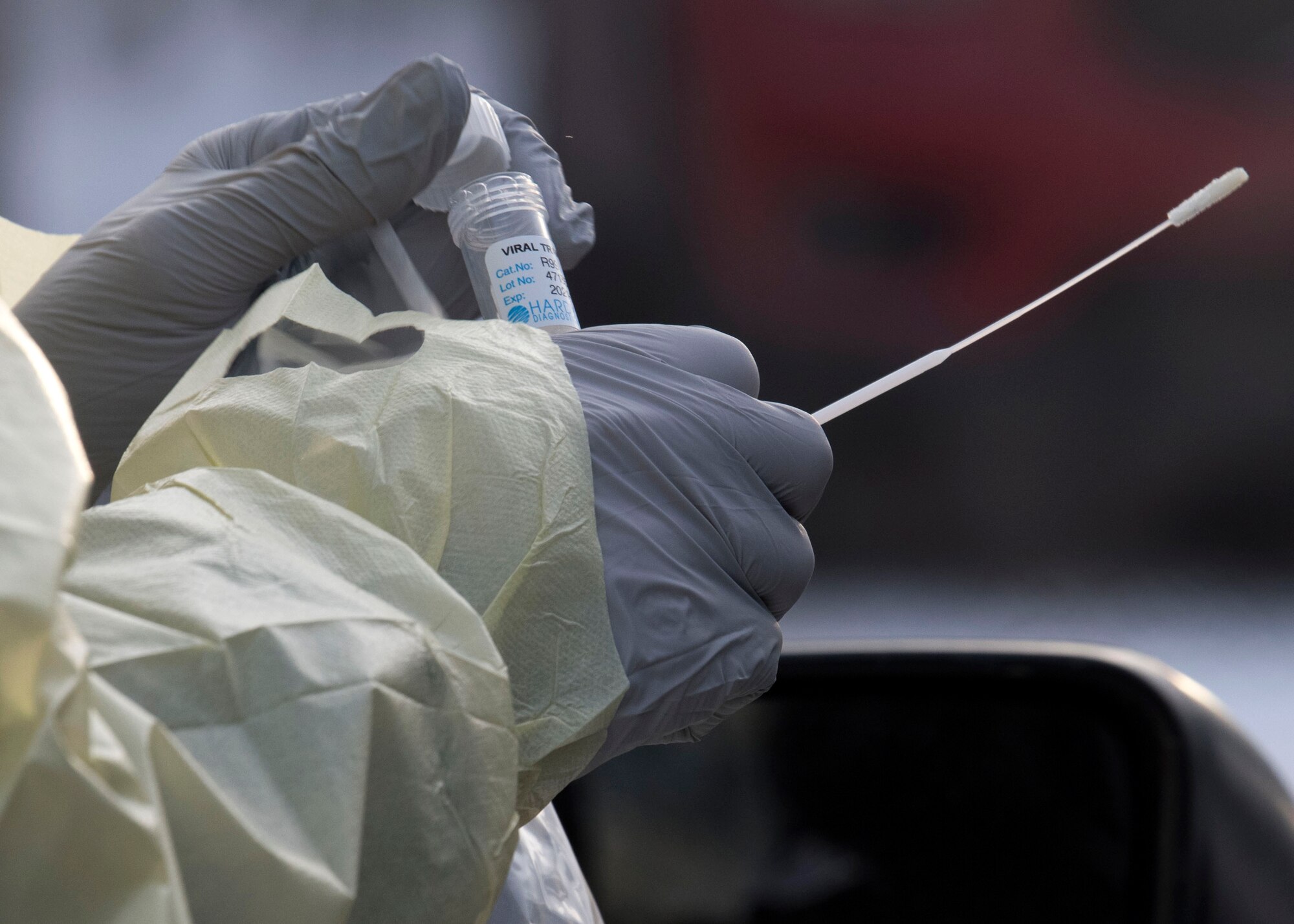 U.S. Army Pvt. Daniel Murtagh, a combat medic specialist assigned to the 1st Squadron, 40th Cavalry Regiment (Airborne), 4th Infantry Brigade Combat Team (Airborne), 25th Infantry Division, U.S. Army Alaska, prepares a sample to be tested for COVID-19 at Joint Base Elmendorf-Richardson, Alaska, Nov. 20, 2020. The 673d MDG stood-up a drive-thru testing clinic to offer a fast, safe way to provide testing to base personnel and their dependents.