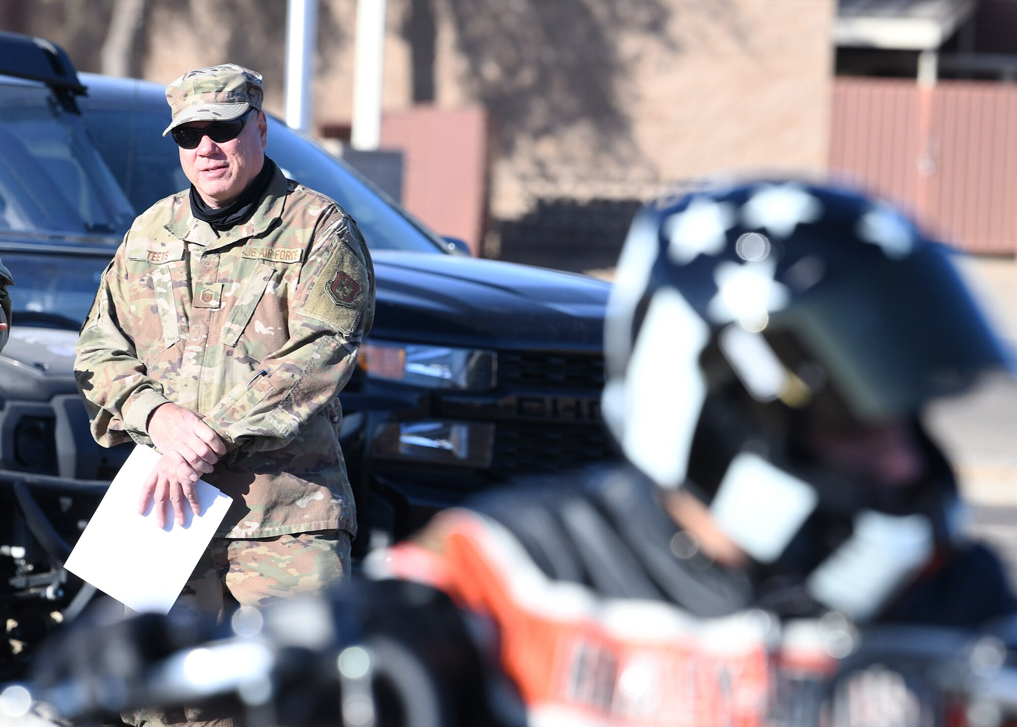 Master Sgt. Richard Teets, 944th Fighter Wing Safety manager, oversees motorcycle riders as they prepare to depart on a motorcycle safety mentorship ride Nov. 8 at Luke Air Force Base, Ariz. The program provides members with their required motorcycle safety training certification.