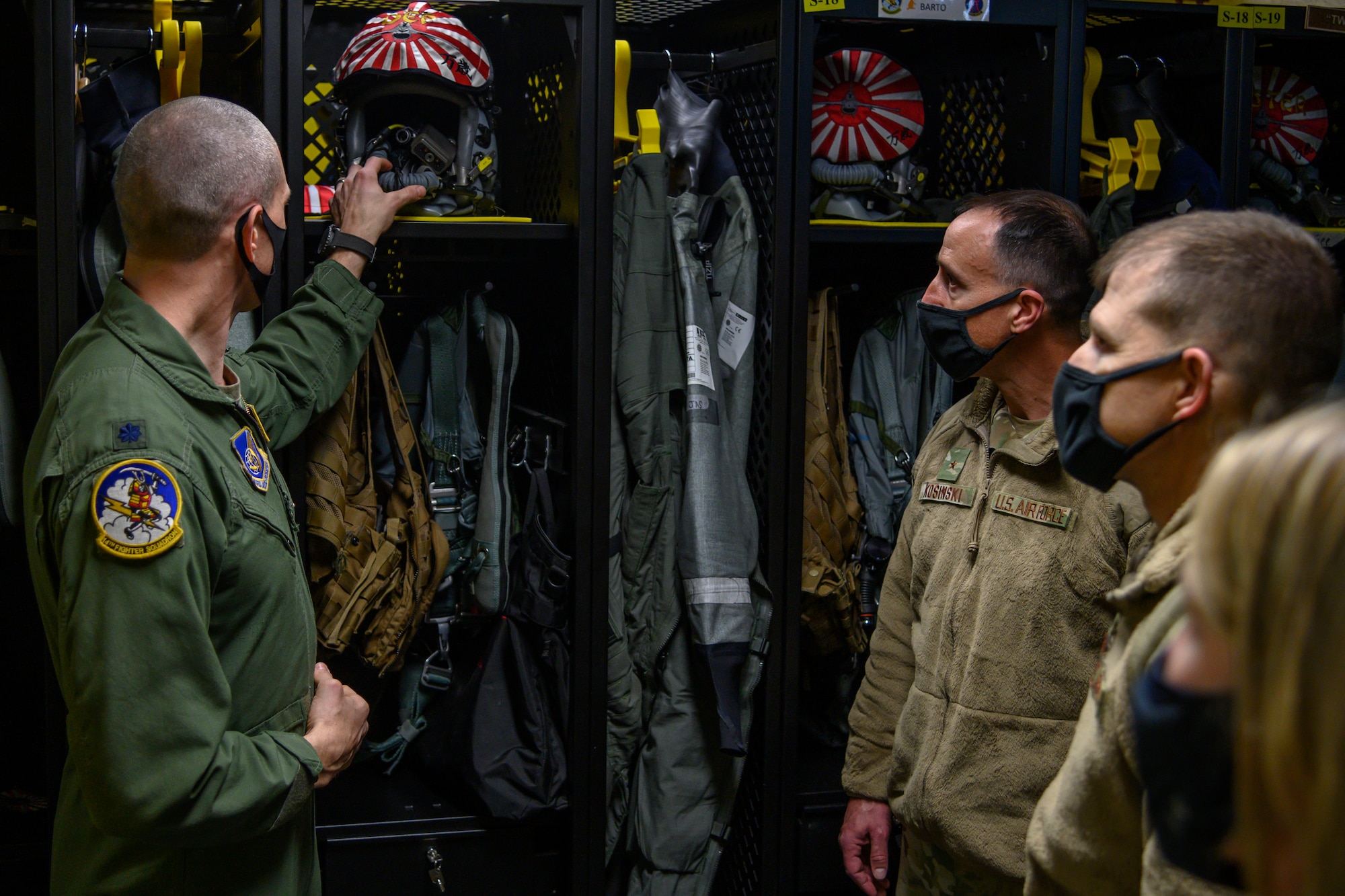 U.S. Air Force Brig. Gen. Leonard J. Kosinski, the 5th Air Force vice commander, receives a briefing on aircrew flight equipment, or AFE, at Misawa Air Base, Japan, Nov. 23, 2020. In order to carry out the mission, every plane and pilot must be equipped and ready for any situation. AFE is one of the many units that ensure the safety and success of flying missions. (U.S. Air Force photo by Airman 1st Class China M. Shock)