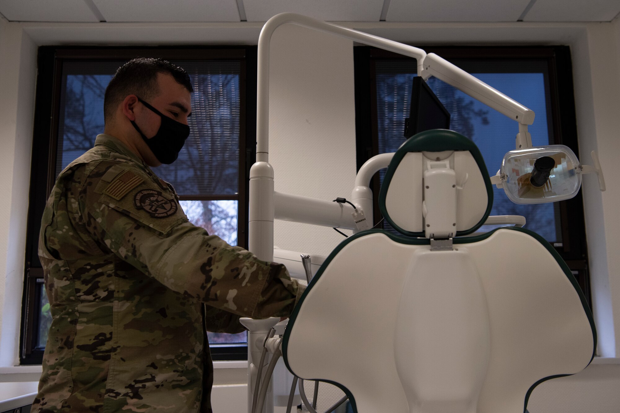 U.S. Air Force Tech. Sgt. Cesar Soto-Betancourt, 86th Dental Squadron general dentistry noncommissioned officer in charge, checks dental equipment at Ramstein Air Base, Germany, Nov. 23, 2020.
