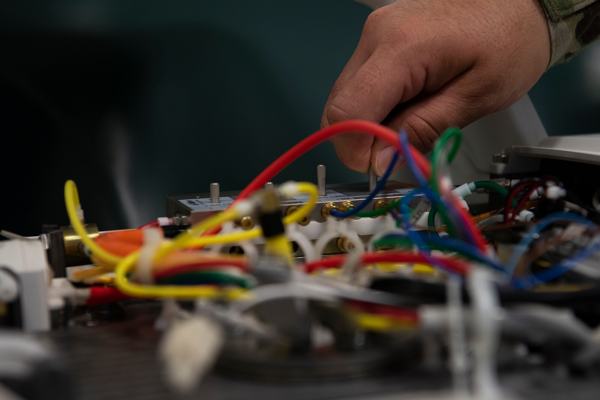 U.S. Air Force Tech. Sgt. Cesar Soto-Betancourt, 86th Dental Squadron general dentistry noncommissioned officer in charge, checks the electrical components on a dental chair at Ramstein Air Base, Germany, Nov. 23, 2020.