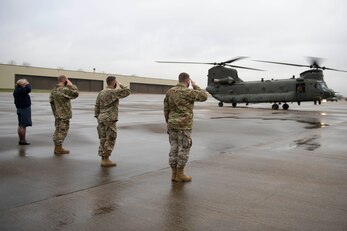U.S. Air Force Col. Kurt Wendt, right, 501st Combat Support Wing commander, U.S. Air Force Col. Jon Hannah, second right, 422nd Air Base Group commander, U.S. Air Force Lt. Col. Joseph Knothe, second left, 420th Air Base Squadron commander, and Royal Air Force Sqn. Ldr. Jayne Robertson, left, RAF Fairford RAF commander, salute the departure of U.S. Air Force Gen. Tod D. Wolters, NATO Supreme Allied Commander Europe and U.S. European Command commander, British Army Gen. Tim Radford, Deputy Supreme Allied Commander Europe (DSACEUR) for NATO, German Army Gen. Jörg Vollmer, Allied Joint Force Command Brunssum commander, and U.K. Chief of the Defence Staff, Gen. Sir Nick Carter GCB CBE DSO ADC Gen, on a Royal Air Force CH-47 Chinook helicopter at Royal Air Force Fairford, England, Nov. 18, 2020, in support of NATO Exercise Loyal Leda 2020 (LOLE20). Allied Land Command (LANDCOM) conducted a combat readiness evaluation on the NATO Headquarters Allied Rapid Reaction Corp (ARRC) during LOLE20, which took place at RAF Fairford and South Cerney, England, Nov. 9-19, 2020. This was a complex multi-domain exercise designed to test the war-fighting capabilities of the ARRC in a COVID-19 environment including combat operations. LOLE20 was a key NATO exercise to validate and certify the Gloucester-based ARRC as a NATO war-fighting corps at full operational readiness, capable of commanding up to 120,000 multinational troops across a full spectrum of military operations. (U.S. Air Force photo by Senior Airman Jennifer Zima)