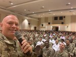 Army Chief Warrant Officer 4 Clifford Bauman, an automations officer with the Army National Guard Readiness Center’s Aviation and Safety Division, takes a selfie with Soldiers from the Eighth Army at U.S. Army Garrison Humphreys (Camp Humphreys), South Korea, in September 2019. Bauman survived a suicide attempt, and speaks at events and conferences to help prevent those who may be in crisis from taking their lives.
