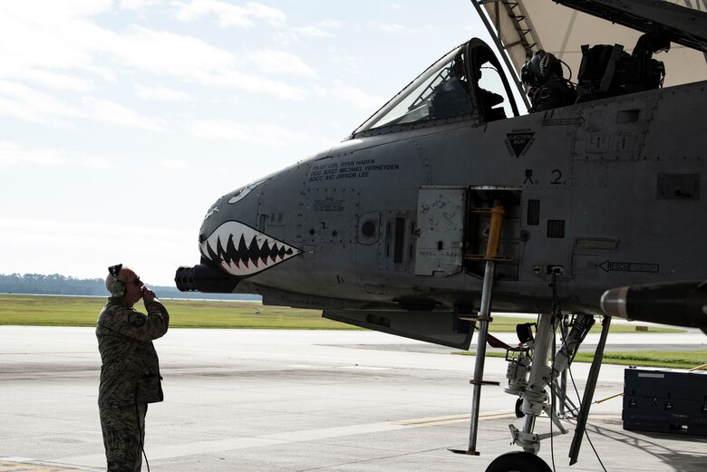 Retired crew chief talks to pilot.