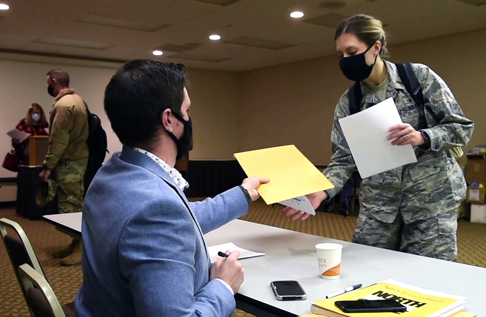 Nurses from the U.S. Air Force arrive in North Dakota and proceed through the Department of Defense's Joint Reception, Staging, and Onward Integration process, followed by the North Dakota Department of Health's in-processing.