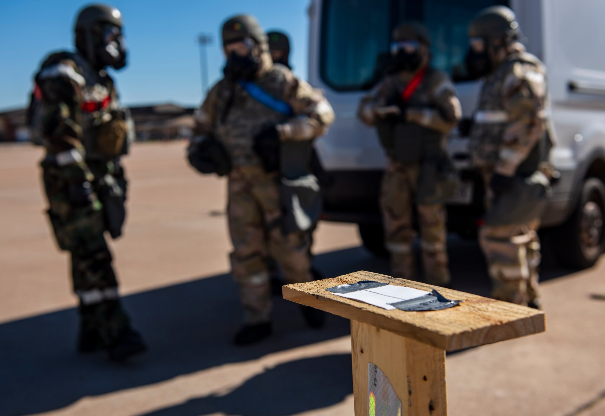 Airmen assigned to the 317th Maintenance Group and 317th Aircraft Maintenance Squadron review simulated M9 chemical detection paper during the Chemical Fury exercise at Dyess Air Force Base, Texas, Nov. 18, 2020.