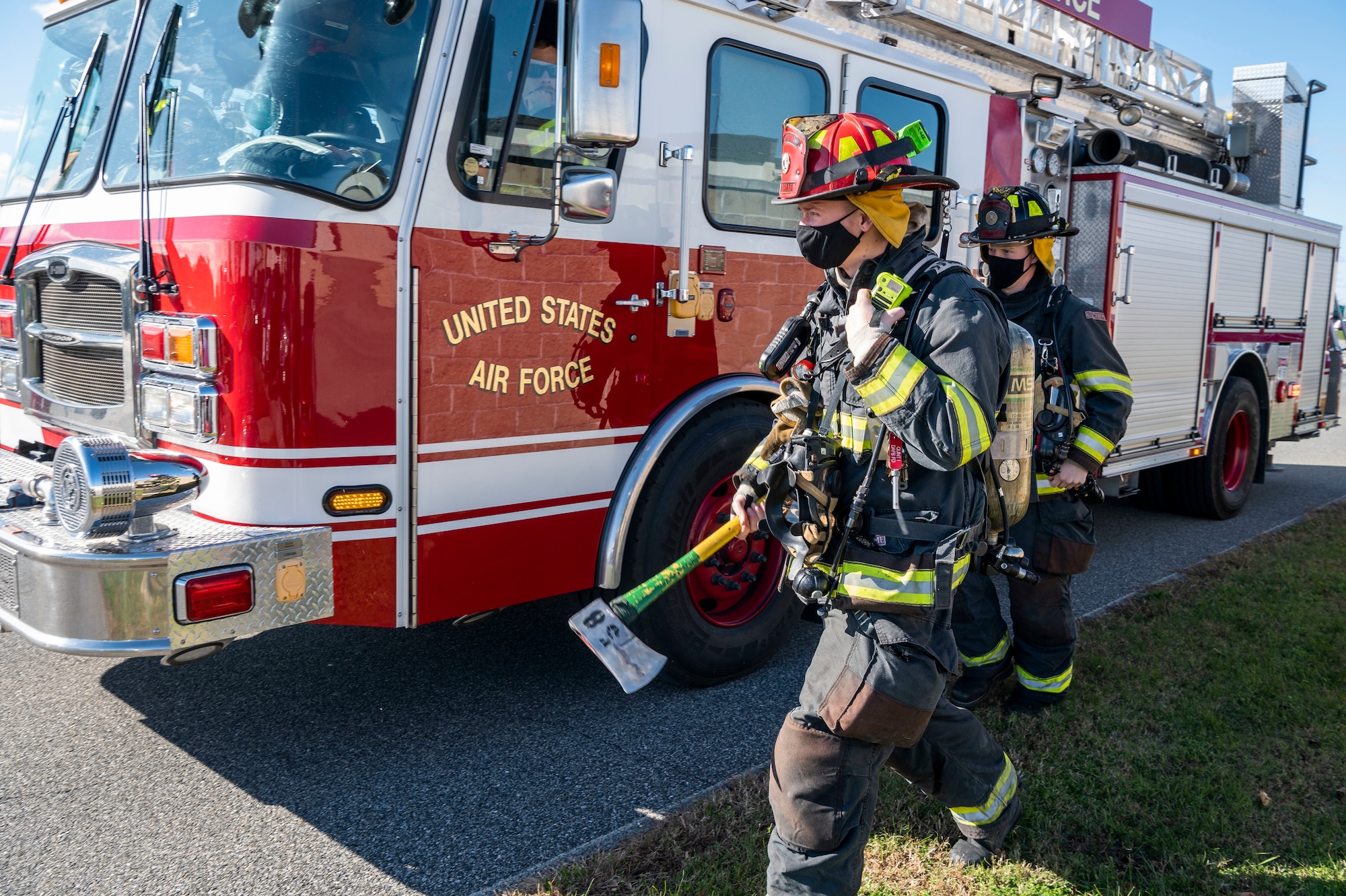 Firefighters from the 436th Civil Engineer Squadron prepare to search for a suspicious package during a force protection exercise scenario Nov. 18, 2020, at Dover Air Force Base, Delaware. Team Dover first responders were tested through numerous scenarios, ensuring the safety of base personnel and assets. (U.S. Air Force photo by Senior Airman Christopher Quail)