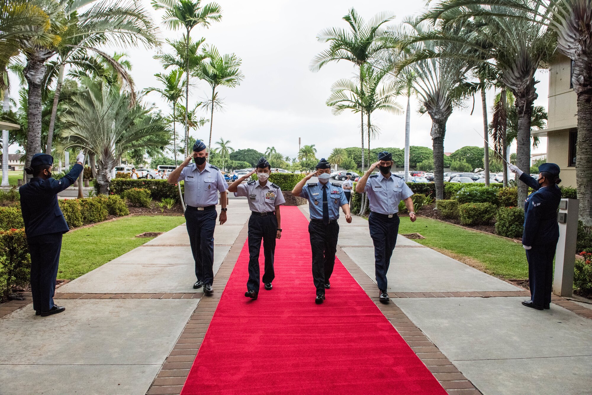 From left: U.S. Space Force Gen. John W. "Jay" Raymond, Chief of Space Operations, Koku-Jieitai Gen. Shunji Izutsu, Chief of Staff Japan Air Self-Defense Force (JASDF), Gen. Lee Seong Yong, Chief of Staff Republic of Korea Air Force (ROKAF), and U.S. Air Force Gen. Ken Wilsbach, Pacific Air Forces (PACAF) commander, walk through an honor cordon during a visit to PACAF Headquarters at Joint Base Pearl Harbor-Hickam, Hawaii, Nov. 19, 2020. The first official visit for Raymond provided opportunities to discuss the Space Force’s foundational direction and the importance of interoperability with allies and partners in the Indo-Pacific region. (U.S. Air Force photo by Staff Sgt. Hailey Haux)