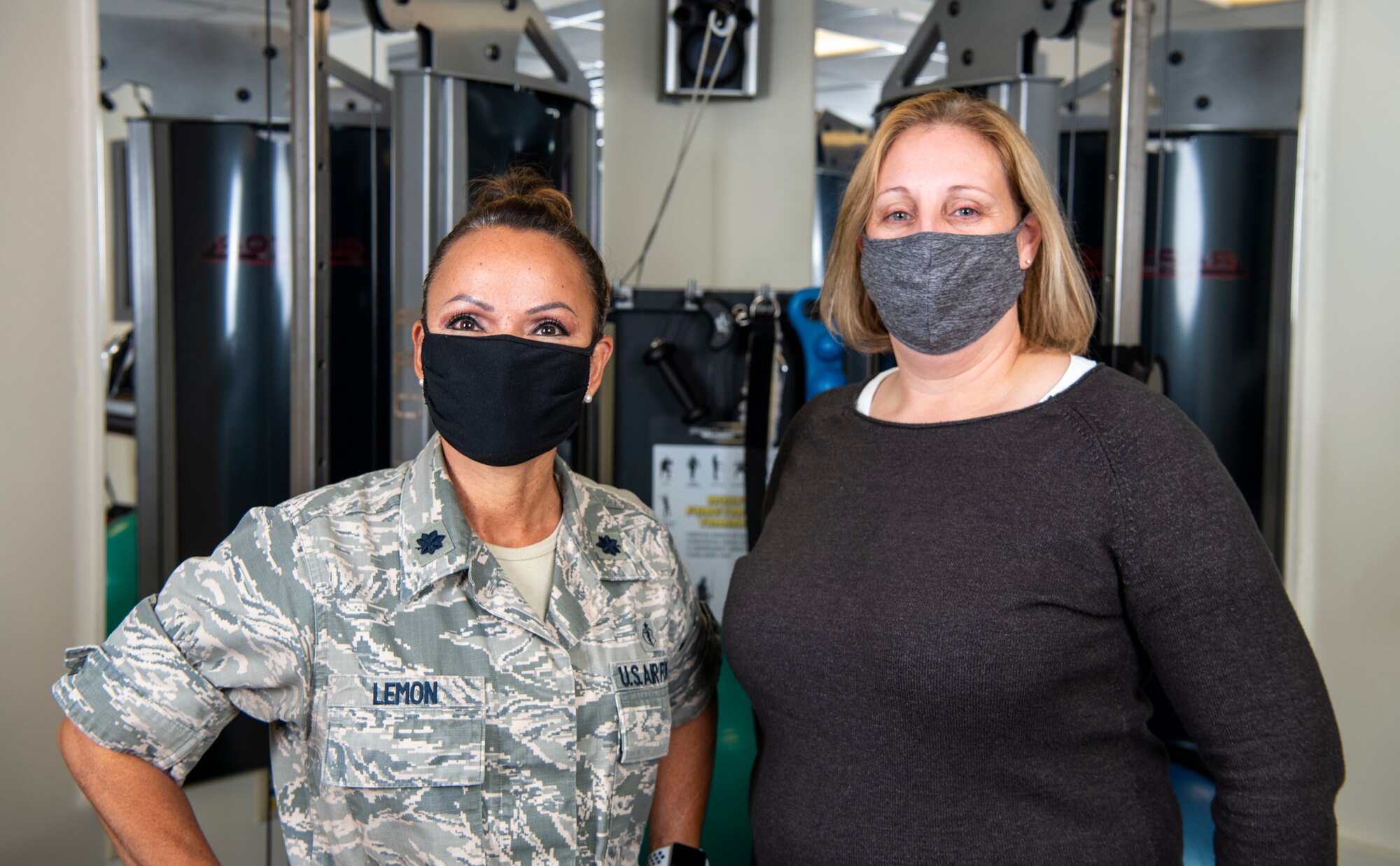 Lt. Col. Denise Lemon and Andrea Matthes Berg, Operational Support Team members from the 436th Medical Group, pose for a photo Nov. 12, 2020 at Dover Air Force Base, De. OST is an embedded medical team focused on building preventative mental health and physical fitness programs tailored to each individual squadron’s needs. (U.S. Air Force photo by Airman Cydney Lee)