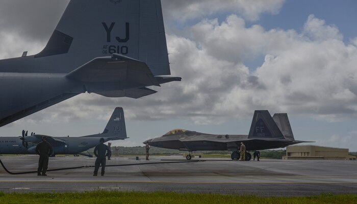 C-130J Super Hercules refuels F-22 Raptors using Aerial Bulk Fuel Delivery System