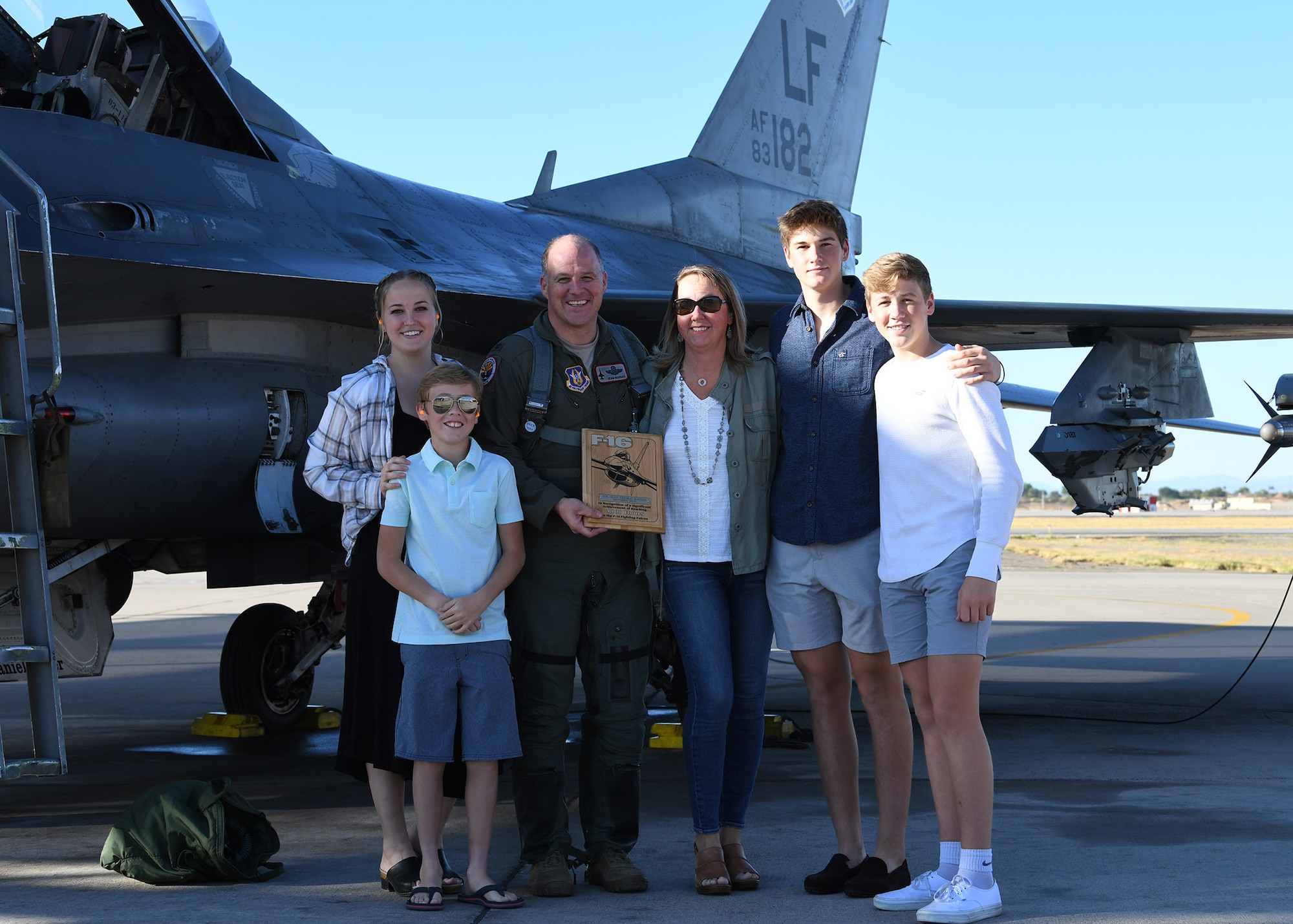 Col. Sean Rassas, 944th Fighter Wing vice commander, poses with his family in front of an F-16 Fighting Falcon following his 2,024th sortie Nov. 24, 2020, at Luke Air Force Base, Ariz.  During the flight, Rassas surpassed three thousand hours in the F-16, becoming one of only 296 U.S. Air Force pilots to reach that unique milestone.