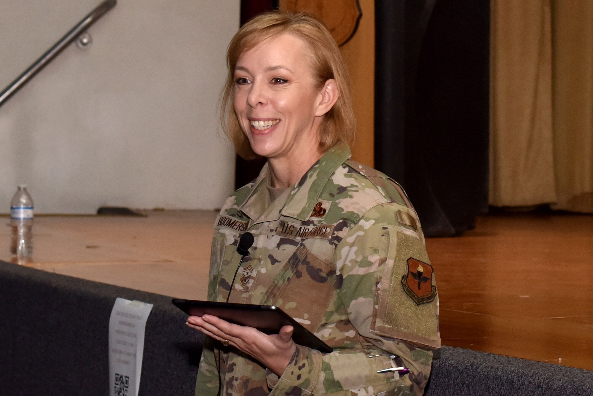 U.S. Air Force Chief Master Sgt. Casy Boomershine, 17th Training Wing command chief, holds an enlisted call in the base theater on Goodfellow Air Force Base, Texas, Nov. 23, 2020. Boomershine used this time to share major moments in her career and what she learned from them. (U.S. Air Force photo by Staff Sgt. Seraiah Wolf)