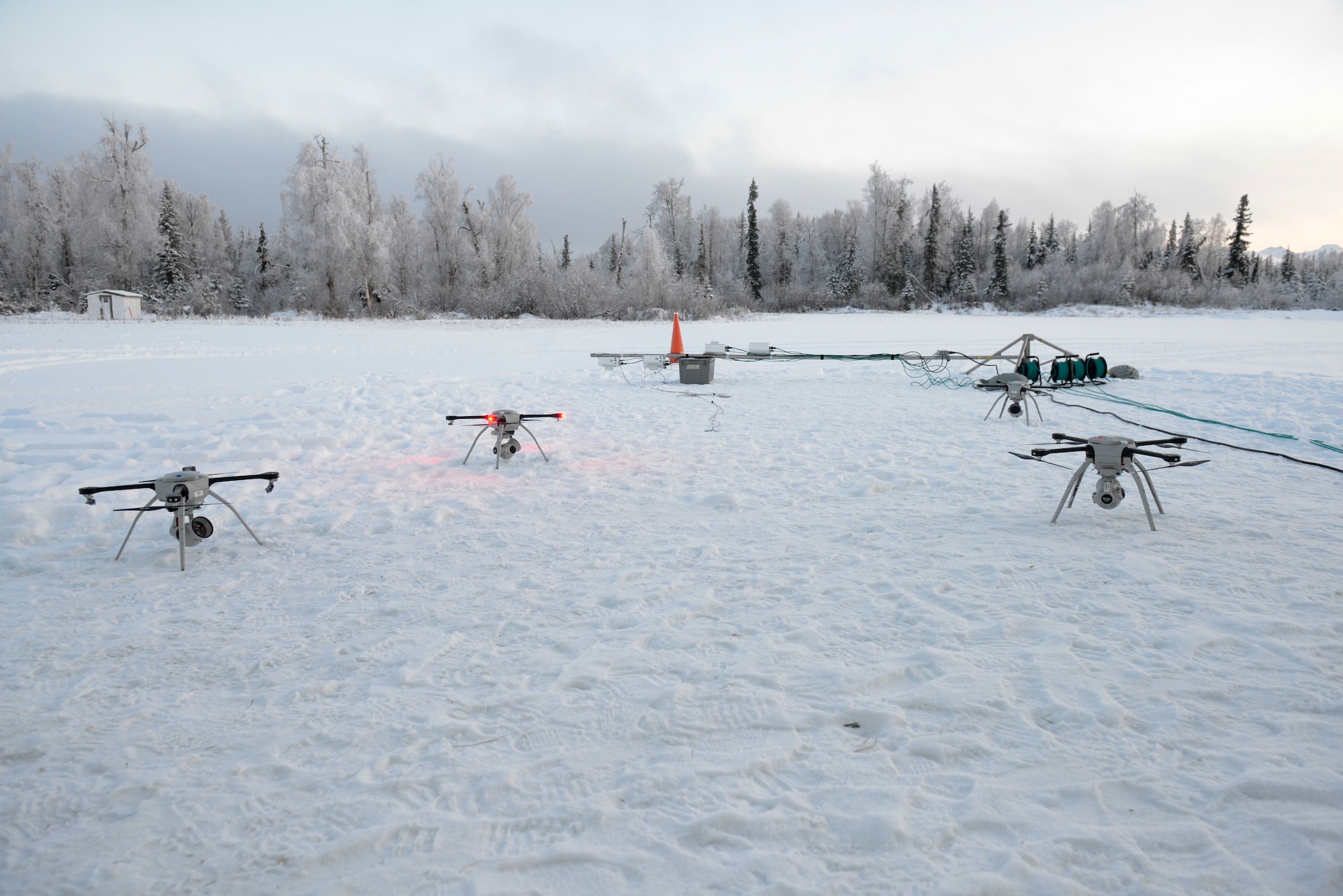 U.S. Air Force civil engineers fly a Small Unmanned Aircraft System during a newly adopted Rapid Airfield Damage Assessment System training course at Joint Base Elmendorf-Richardson, Alaska, Nov. 17, 2020. Throughout the first week of training, Airmen focused on learning to fly the SUAS. During the second week they learned to fly the RADAS mission while using the SUAS systems. (U.S. Air Force photo by Airman 1st Class Jordan Smith)