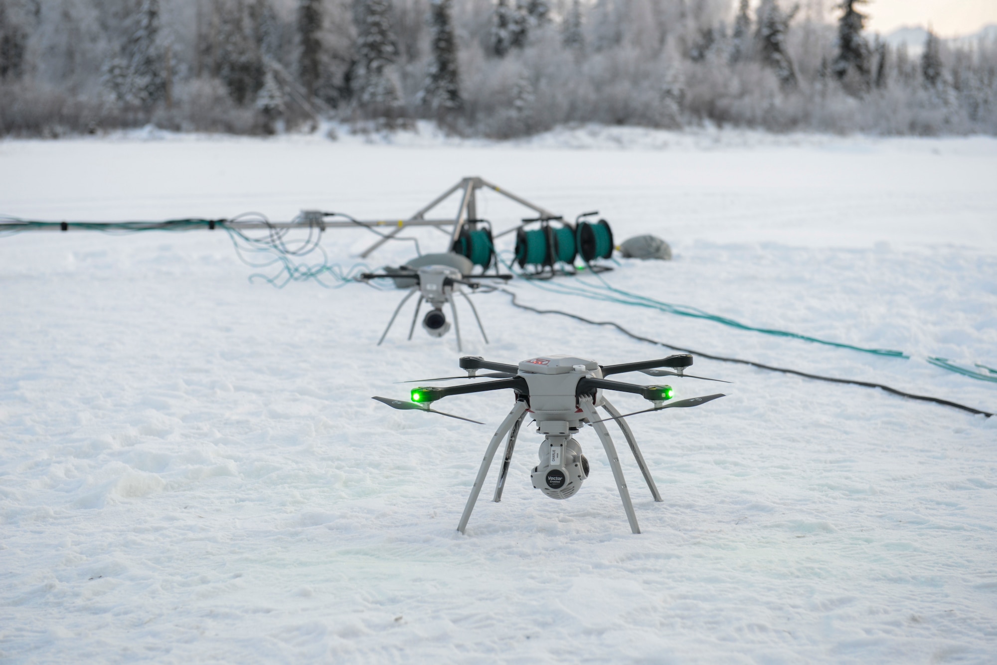 U.S. Air Force civil engineers fly a Small Unmanned Aircraft System during a newly adopted Rapid Airfield Damage Assessment System training course at Joint Base Elmendorf-Richardson, Alaska, Nov. 17, 2020. Throughout the first week of training, Airmen focused on learning to fly the SUAS. During the second week they learned to fly the RADAS mission while using the SUAS systems. (U.S. Air Force photo by Airman 1st Class Jordan Smith)