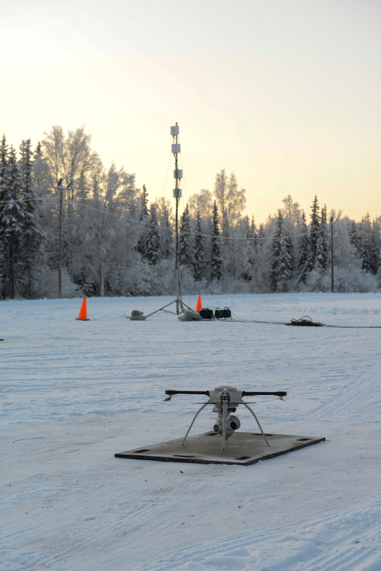 U.S. Air Force civil engineers fly a Small Unmanned Aircraft System during a newly adopted Rapid Airfield Damage Assessment System training course at Joint Base Elmendorf-Richardson, Alaska, Nov. 17, 2020. Throughout the first week of training, Airmen focused on learning to fly the SUAS. During the second week they learned to fly the RADAS mission while using the SUAS systems. (U.S. Air Force photo by Airman 1st Class Jordan Smith)