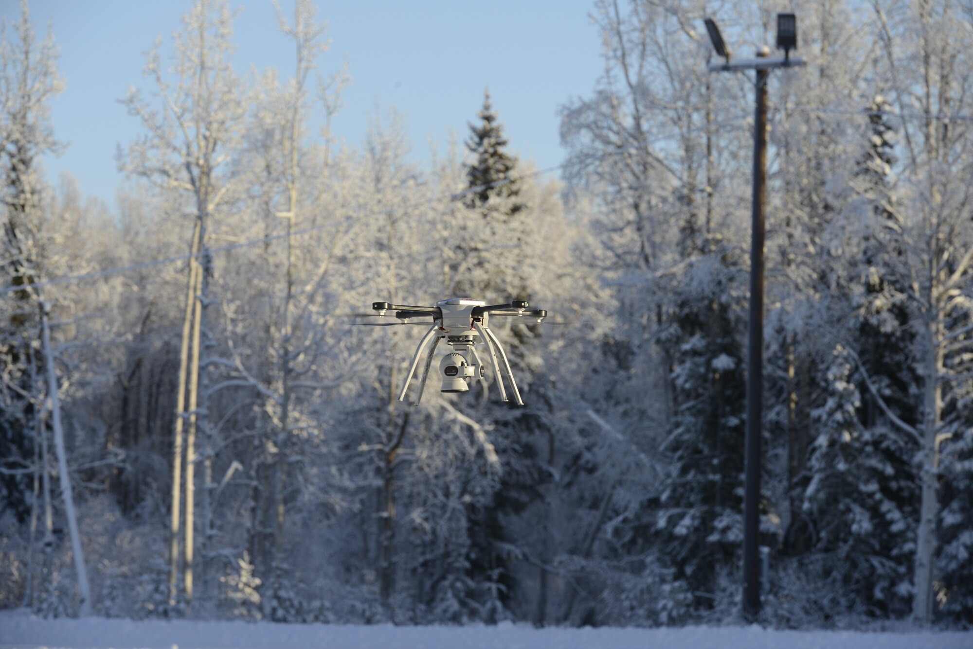 U.S. Air Force civil engineers fly a Small Unmanned Aircraft System during a newly adopted Rapid Airfield Damage Assessment System training course at Joint Base Elmendorf-Richardson, Alaska, Nov. 18, 2020. Throughout the first week of training, Airmen focused on learning to fly the SUAS. During the second week they learned to fly the RADAS mission while using the SUAS systems. (U.S. Air Force photo by Airman 1st Class Jordan Smith)