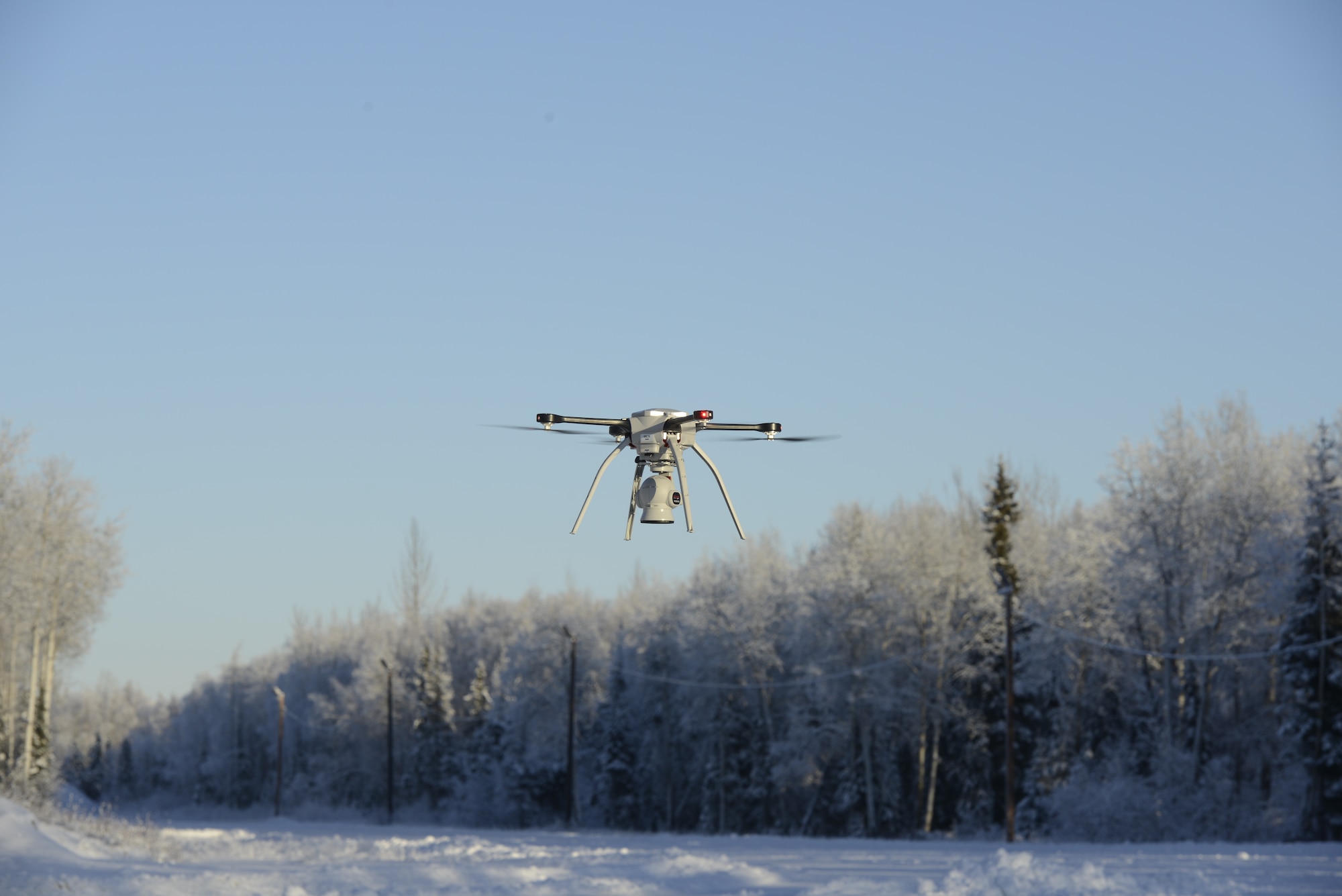 U.S. Air Force civil engineers fly a Small Unmanned Aircraft System during a newly adopted Rapid Airfield Damage Assessment System training course at Joint Base Elmendorf-Richardson, Alaska, Nov. 18, 2020. Throughout the first week of training, Airmen focused on learning to fly the SUAS. During the second week they learned to fly the RADAS mission while using the SUAS systems. (U.S. Air Force photo by Airman 1st Class Jordan Smith)