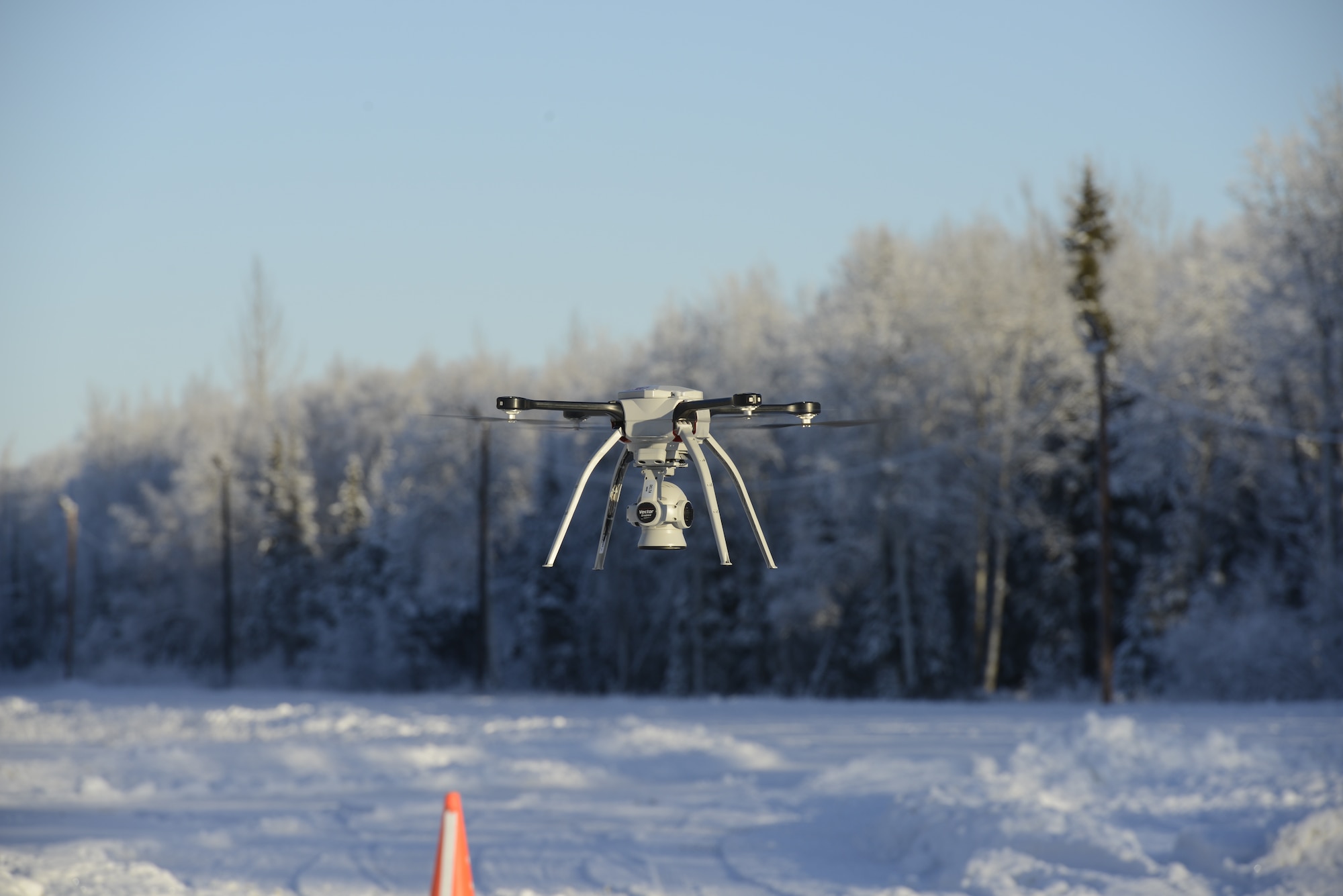 U.S. Air Force civil engineers fly a Small Unmanned Aircraft System during a newly adopted Rapid Airfield Damage Assessment System training course at Joint Base Elmendorf-Richardson, Alaska, Nov. 18, 2020. Throughout the first week of training, Airmen focused on learning to fly the SUAS. During the second week they learned to fly the RADAS mission while using the SUAS systems. (U.S. Air Force photo by Airman 1st Class Jordan Smith)
