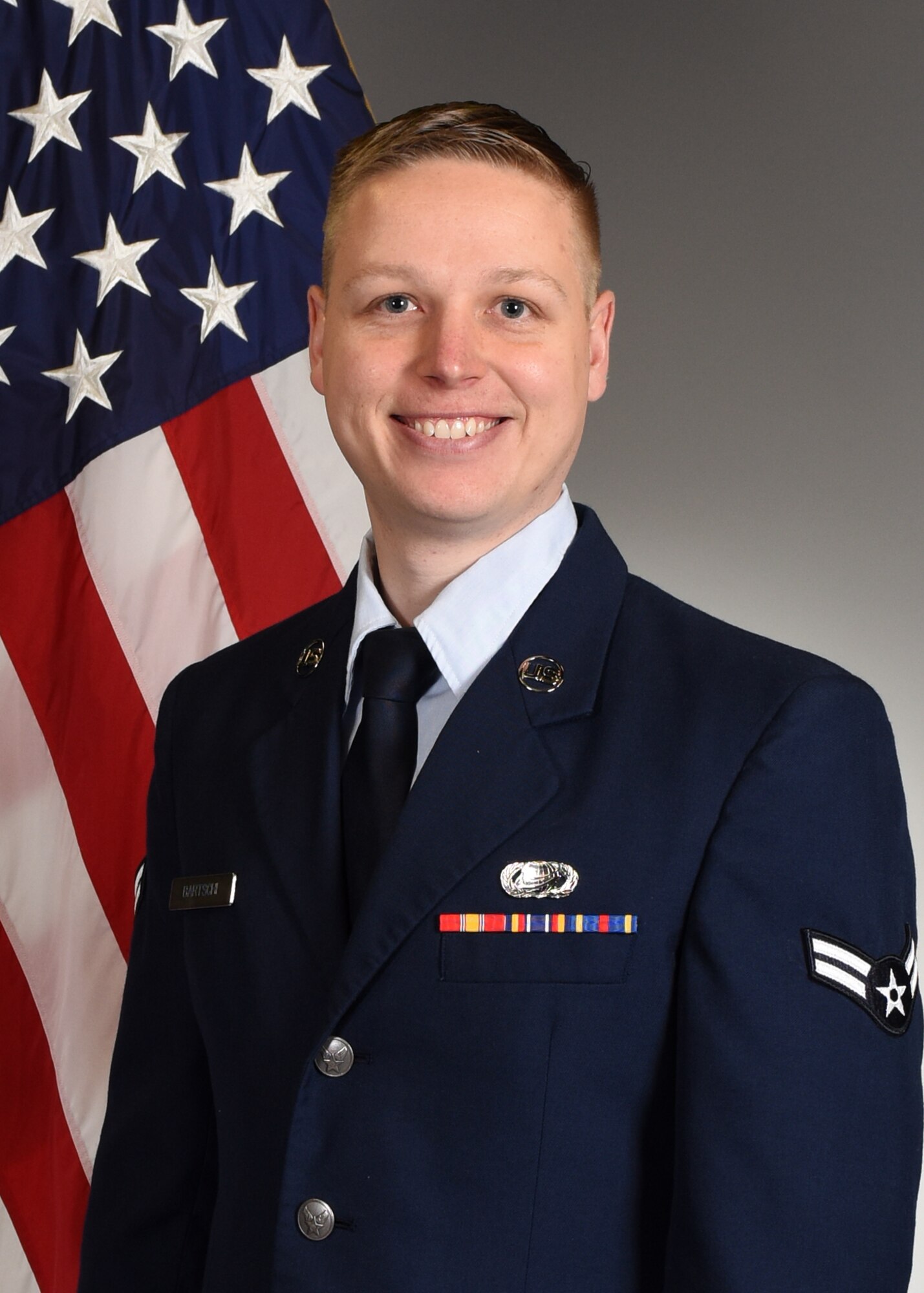 U.S. Air Force airman 1st Class Cody Bartschi, 17th Force Support Squadron student assignment technician, poses for an official photo. Bartschi was chosen as the 17th Training Wing Spotlight for his hard work in helping training, developing and inspiring the future force. (Courtesy Photo)