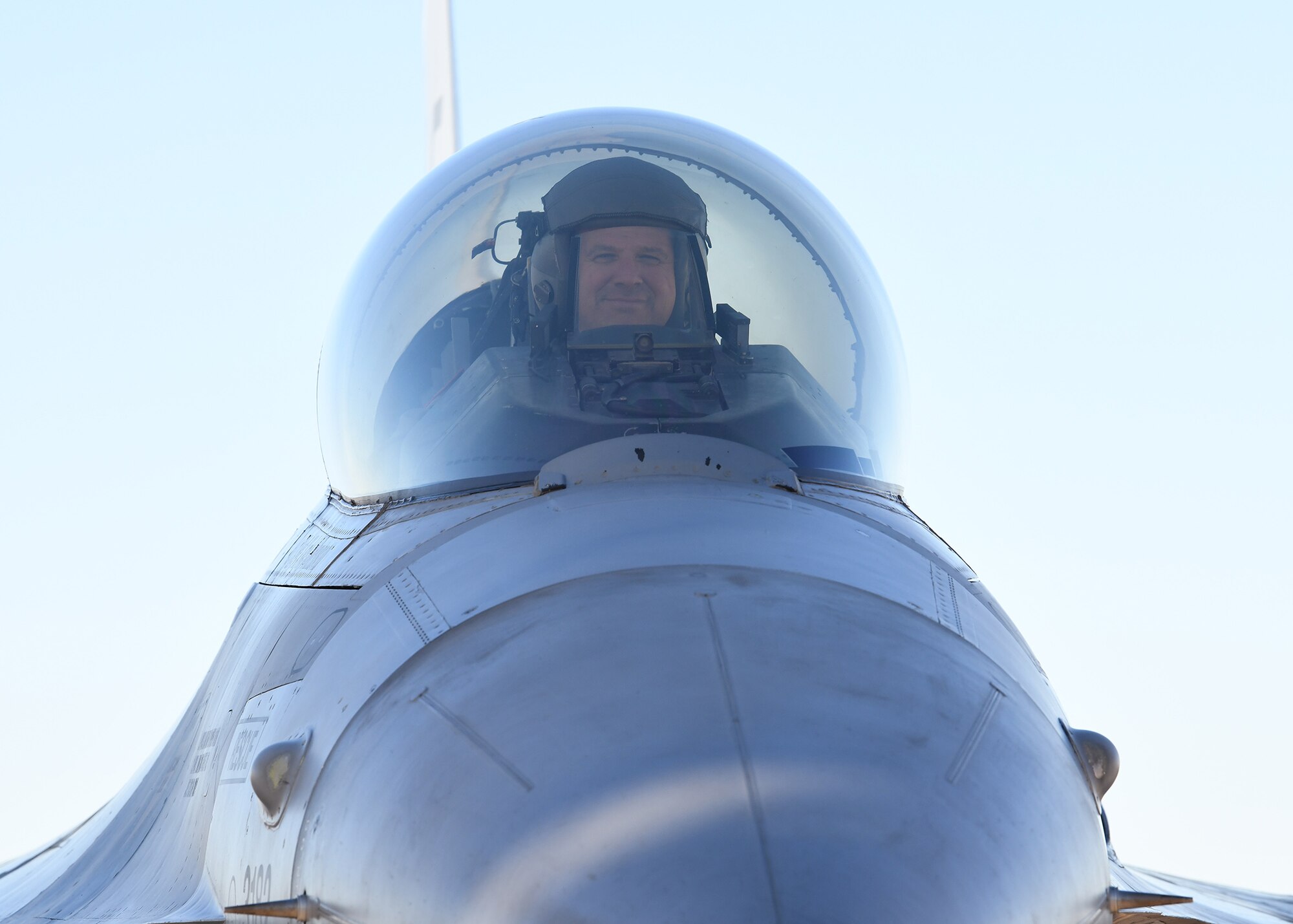 Col. Sean Rassas, 944th Fighter Wing vice commander, smiles from the cockpit of an F-16 Fighting Falcon after completing a milestone sortie Nov. 24, 2020, at Luke Air Force Base, Ariz.  This flight pushed Rassas passed three thousand flying hours in the F-16, making him one of only 296 U.S. Air Force pilots to reach that unique milestone.