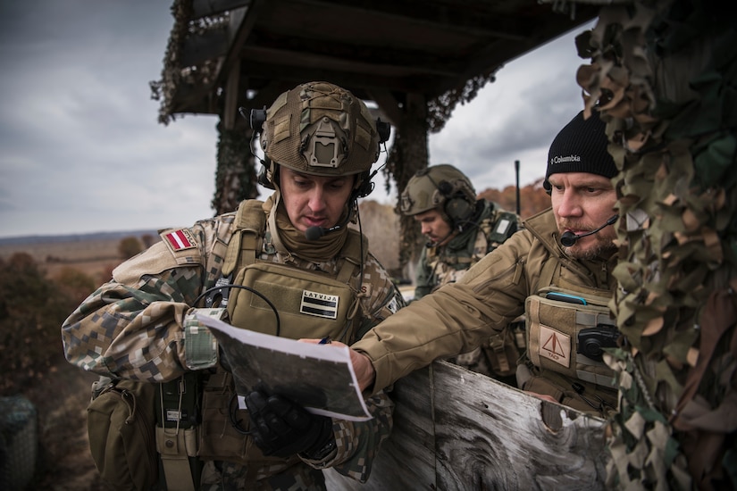 Joint Terminal Attack Controllers from the Latvian National Armed Forces conduct close air support training with U.S. Air Force A-10 Thunderbolt II aircraft assigned to the 107th Fighter Squadron, Selfridge Air National Guard Base, Mich., at Grayling Aerial Gunnery Range in Waters, Mich., October 29, 2019. Michigan and Latvia have been linked under the National Guard Bureau's State Partnership Program since 1993.