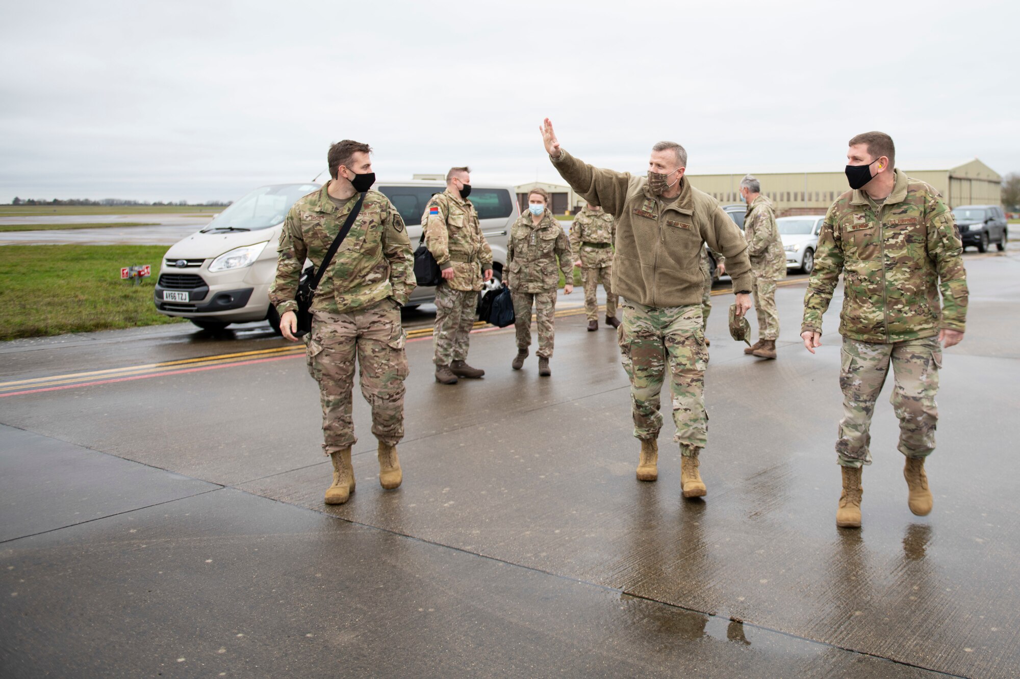 U.S. Air Force Gen. Tod D. Wolters, center, NATO Supreme Allied Commander Europe and U.S. European Command commander, greets service members while preparing to depart on a flight to South Cerney, England, from Royal Air Force Fairford, England, Nov. 18, 2020, in support of NATO Exercise Loyal Leda 2020 (LOLE20). Allied Land Command (LANDCOM) conducted a combat readiness evaluation on the NATO Headquarters Allied Rapid Reaction Corp (ARRC) during LOLE20, which took place at RAF Fairford and South Cerney, England, Nov. 9-19, 2020. This was a complex multi-domain exercise designed to test the war-fighting capabilities of the ARRC in a COVID-19 environment including combat operations. LOLE20 was a key NATO exercise to validate and certify the Gloucester-based ARRC as a NATO war-fighting corps at full operational readiness, capable of commanding up to 120,000 multinational troops across a full spectrum of military operations. (U.S. Air Force photo by Senior Airman Jennifer Zima)