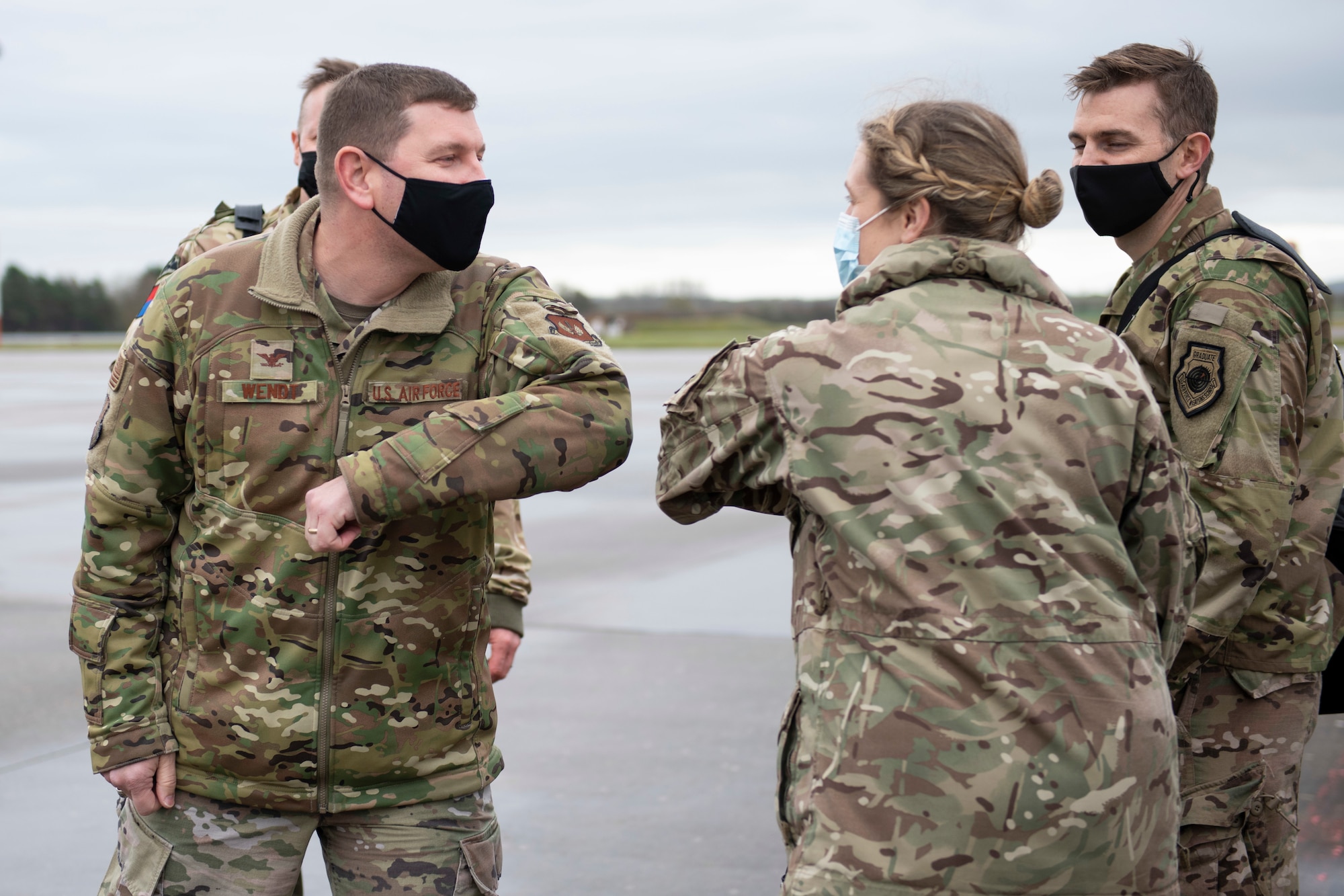 U.S. Air Force Col. Col. Kurt Wendt, left, 501st Combat Support Wing commander, greets a service member from NATO Supreme Headquarters Allied Powers Europe (SHAPE), at Royal Air Force Fairford, England, Nov. 18, 2020. Allied Land Command (LANDCOM) conducted a combat readiness evaluation on the NATO Headquarters Allied Rapid Reaction Corp (ARRC) during LOLE20, which took place at RAF Fairford and South Cerney, England, Nov. 9-19, 2020. This was a complex multi-domain exercise designed to test the war-fighting capabilities of the ARRC in a COVID-19 environment including combat operations. LOLE20 was a key NATO exercise to validate and certify the Gloucester-based ARRC as a NATO war-fighting corps at full operational readiness, capable of commanding up to 120,000 multinational troops across a full spectrum of military operations. (U.S. Air Force photo by Senior Airman Jennifer Zima)