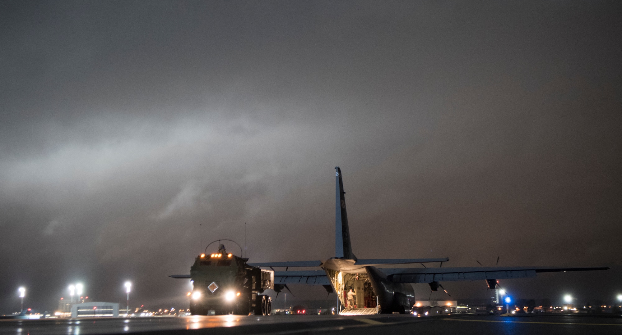 Members of the 37th Airlift Squadron and 41st Field Artillery Brigade worked together to load and transport a High Mobility Artillery Rocket System for exercise Rapid Falcon.