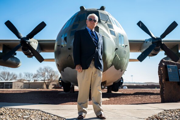 Col. (ret.) Clyde “Neal” Westbrook stands in front of an HC-130P Combat King special operations aerial refueling aircraft static display during his visit to Cannon Air Force Base, N.M., November 19, 2020. Westbrook visited Cannon to reunite with the HC-130P, which he piloted in the Son Tay Raid during the Vietnam War. (U.S. Air Force photo by Senior Airman Maxwell Daigle)