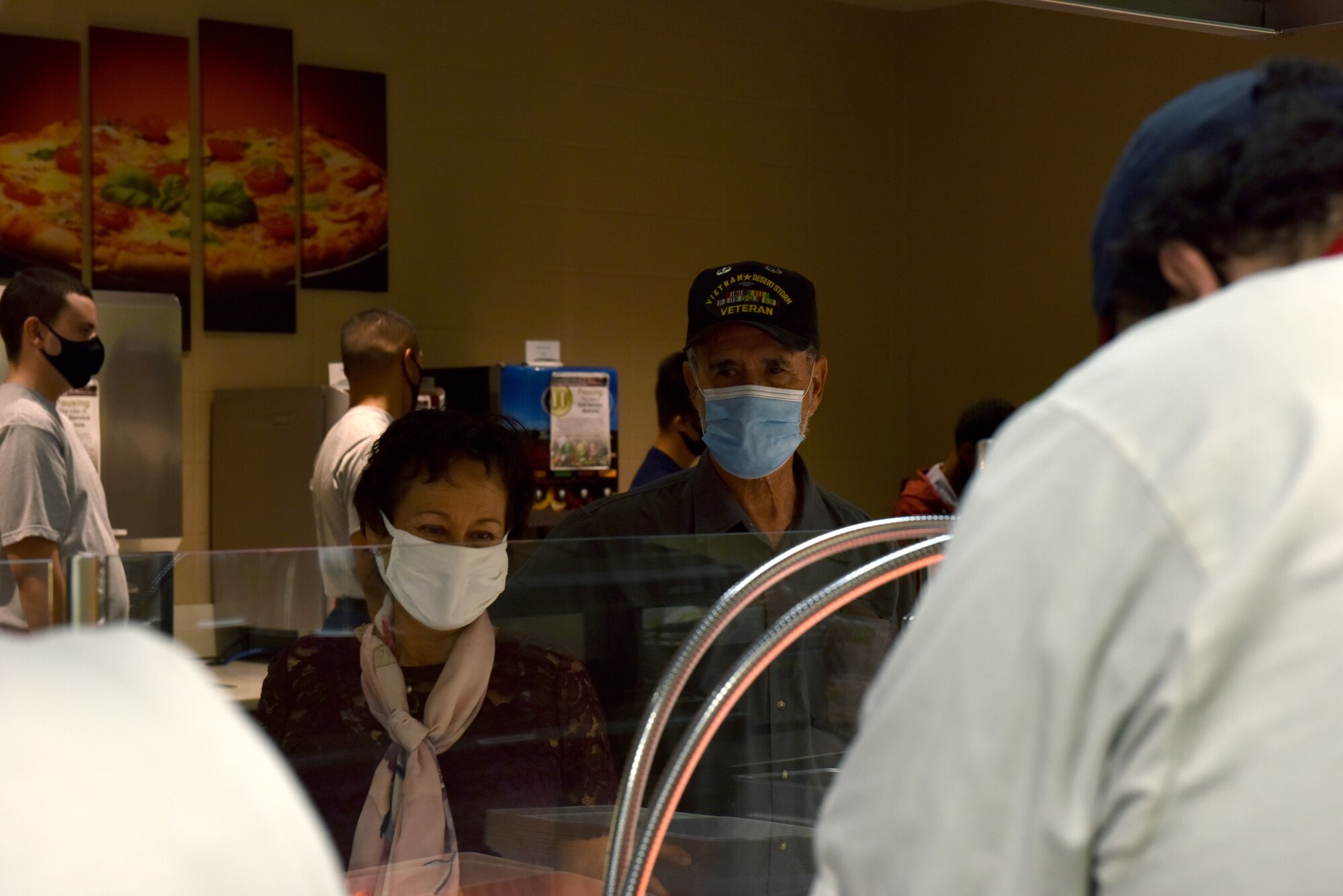 Veteran visitors to the base, wait in line to be served a Thanksgiving meal at the Western Winds Dining Facility on Goodfellow Air Force Base, Texas, Nov. 26, 2020. In recognition of their sacrifices and service, retirees and vetrans in the San Angelo community were able to partake in a Thanksgiving meal on base. (U.S. Air Force photo by Staff Sgt. Seraiah Wolf)