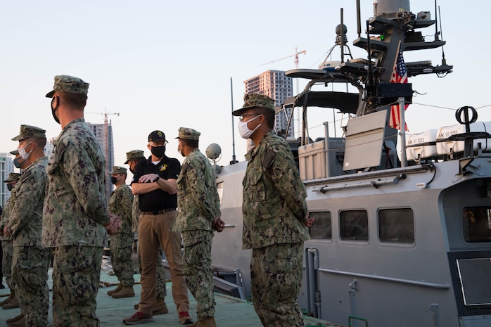 201125-N-IO414-1194 NAVAL SUPPORT ACTIVITY BAHRAIN (Nov. 25, 2020) Acting Secretary of Defense, Christopher C. Miller speaks with Sailors assigned to Commander, Task Force (CTF) 56  during a visit on board Naval Support Activity Bahrain, Nov 25CTF 56 is responsible for the planning and execution of expeditionary missions in the U.S. 5th Fleet area of operations in support of naval operations to ensure maritime stability in the Central Region, connecting the Mediterranean and Pacific through the Western Indian Ocean and three strategic chokepoints to the free flow of global commerce.