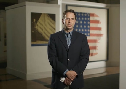 Chris Morton, the assistant curator at the New York State Military Museum, speaks about the historic battle flag collection maintained by the New York State Division of Military and Naval Affairs in the Flag Room of the New York State Capitol in a virtual tour video released on Nov. 10, 2020. Hundreds of historic flags, most from the Civil War, are housed in the room that is part of the New York State Capitol guided tour.