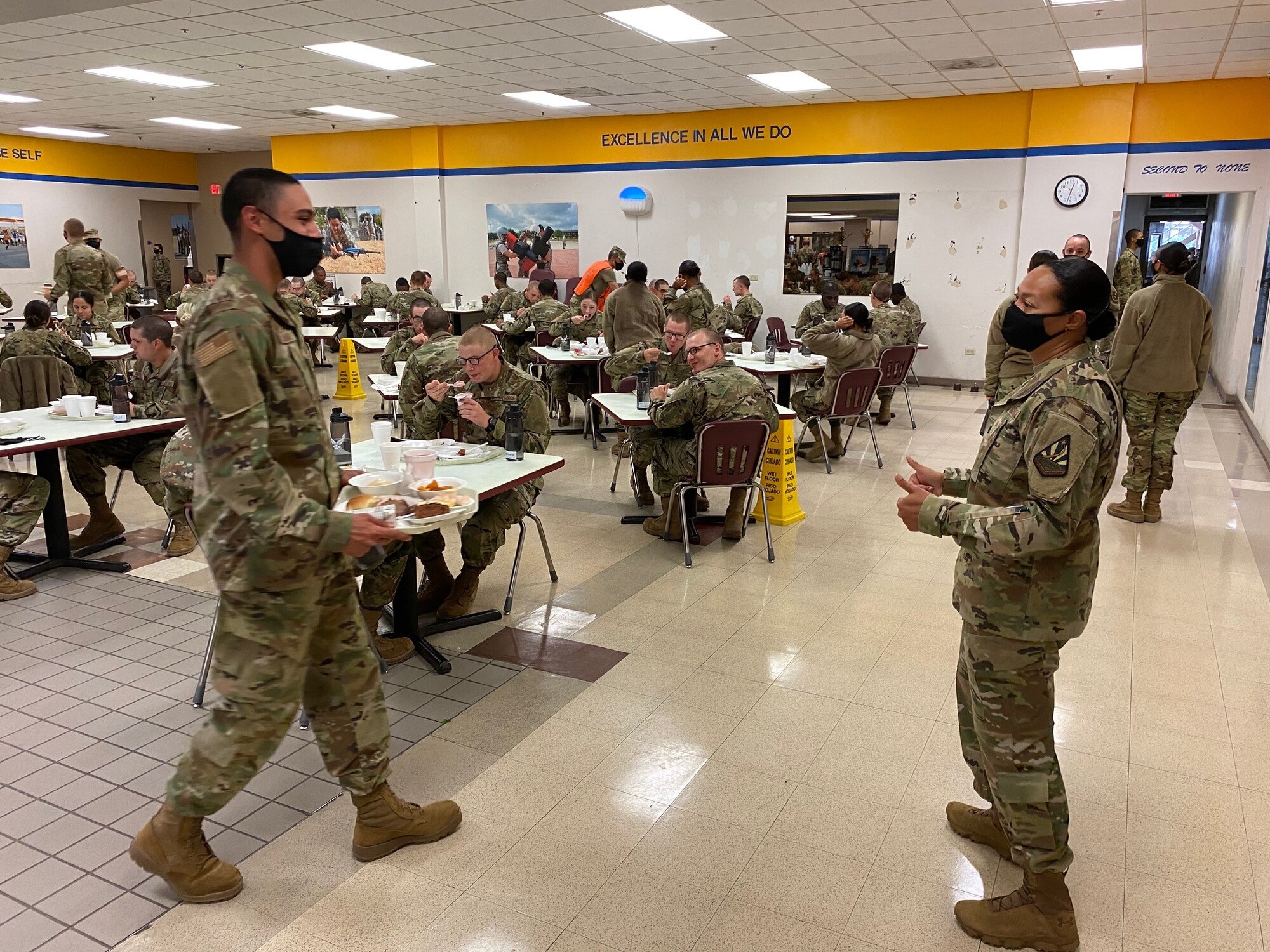 Airmen who graduated from Basic Military Training on Nov. 25 enjoy their Thanksgiving Day meal on Nov. 26 before shipping out to their respective technical training bases on Nov. 27.