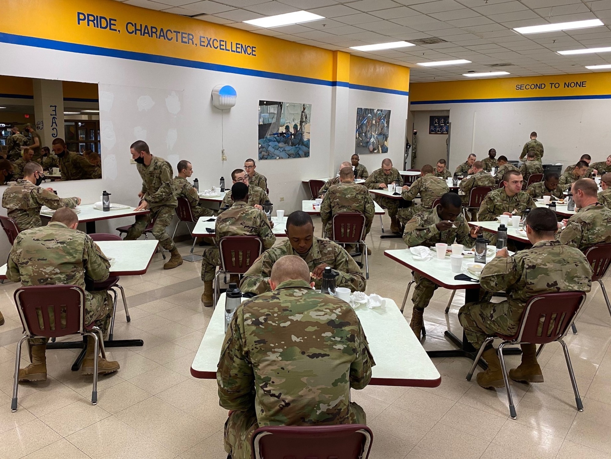 Airmen who graduated from Basic Military Training on Nov. 25 enjoy their Thanksgiving Day meal on Nov. 26 before shipping out to their respective technical training bases on Nov. 27.