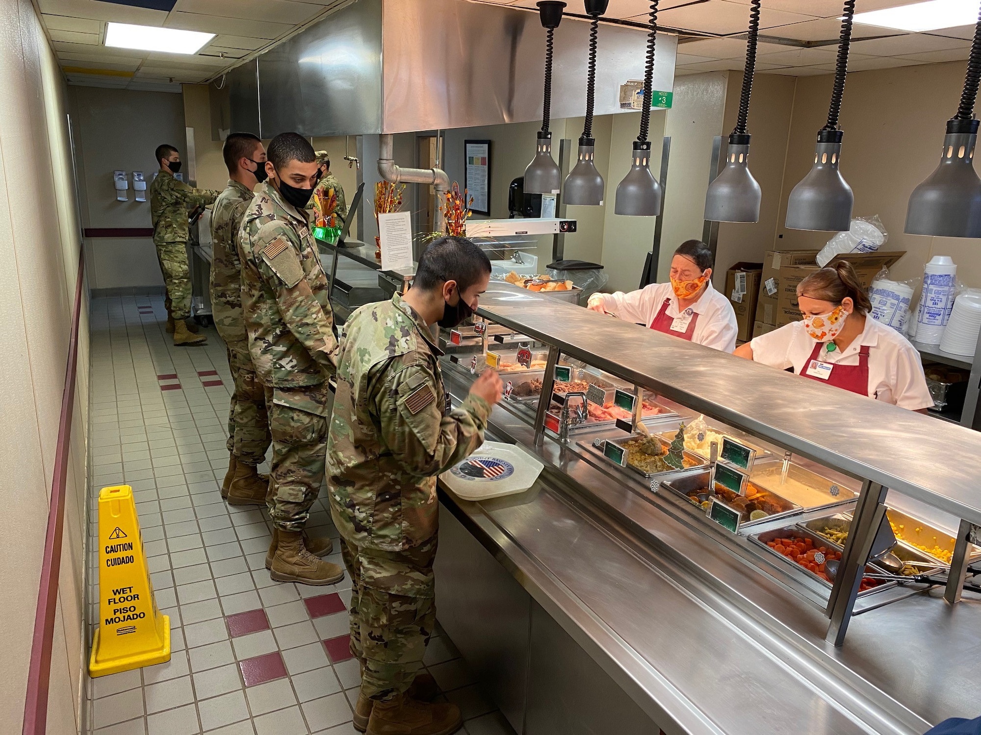 Airmen who graduated from Basic Military Training on Nov. 25 enjoy their first Thanksgiving meal in uniform at Joint Base San Antonio-Lackland, Texas, on Nov. 26.