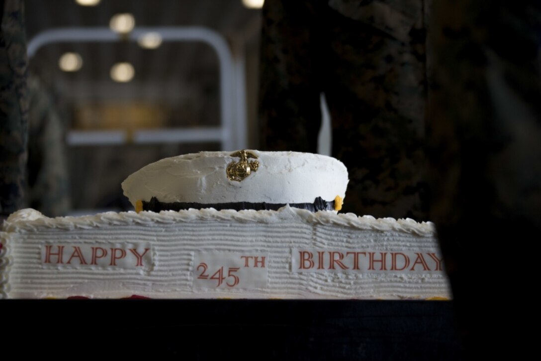 201103-M-PQ459-1379 PACIFIC OCEAN (Nov. 3, 2020) – U.S. Marines and Sailors with the 15th Marine Expeditionary Unit celebrate the 245th Marine Corps birthday with a traditional cake-cutting ceremony aboard the amphibious assault ship USS Makin Island (LHD 8) while underway. The Makin Island Amphibious Ready Group and the 15th MEU are currently conducting at-sea training events in the U.S. 3rd Fleet area of operations. (U.S. Marine Corps photo by Sgt. Sarah Stegall)